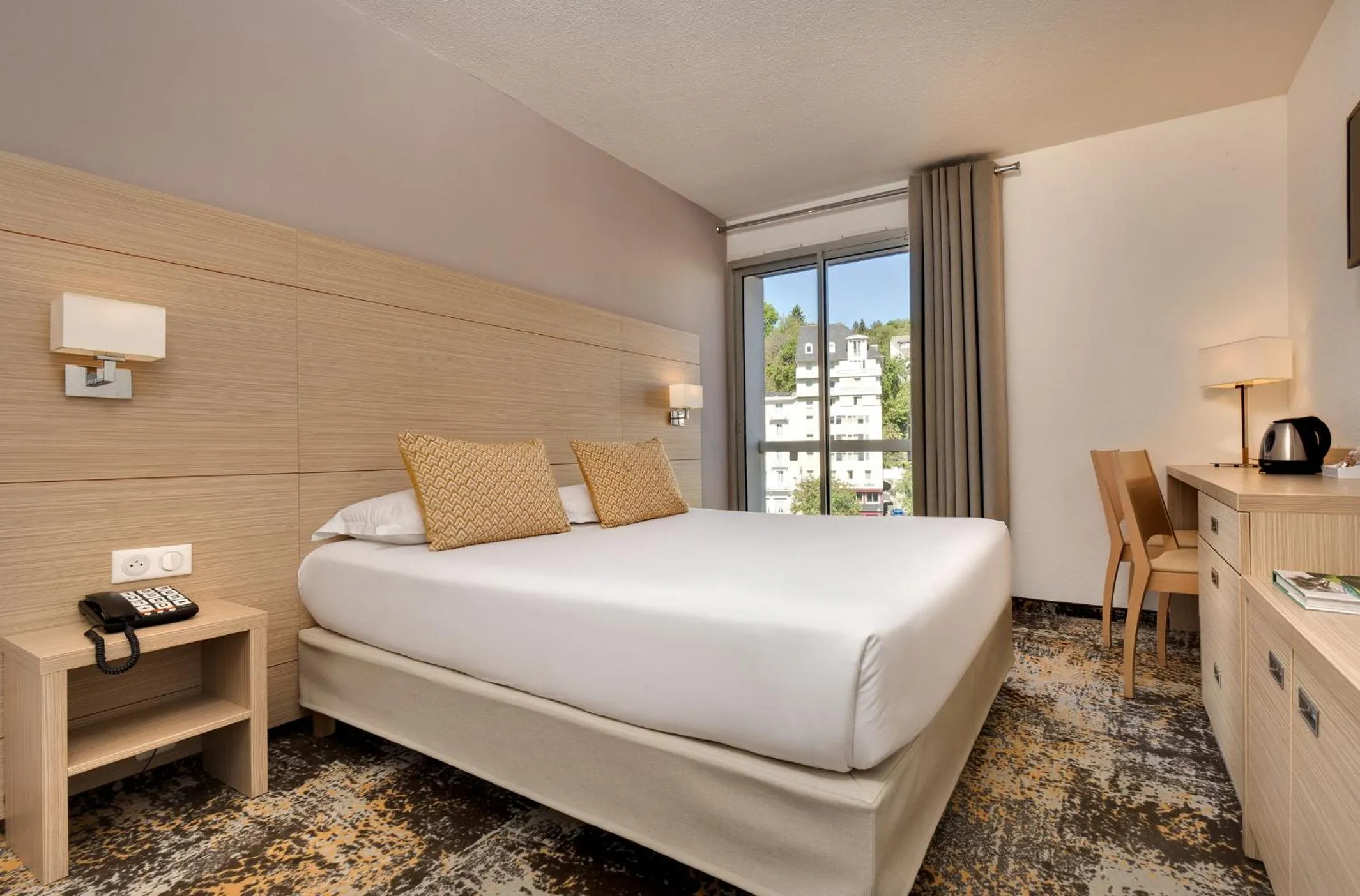 Photo of the whole room, Bed in Hôtel Le Méditerranée