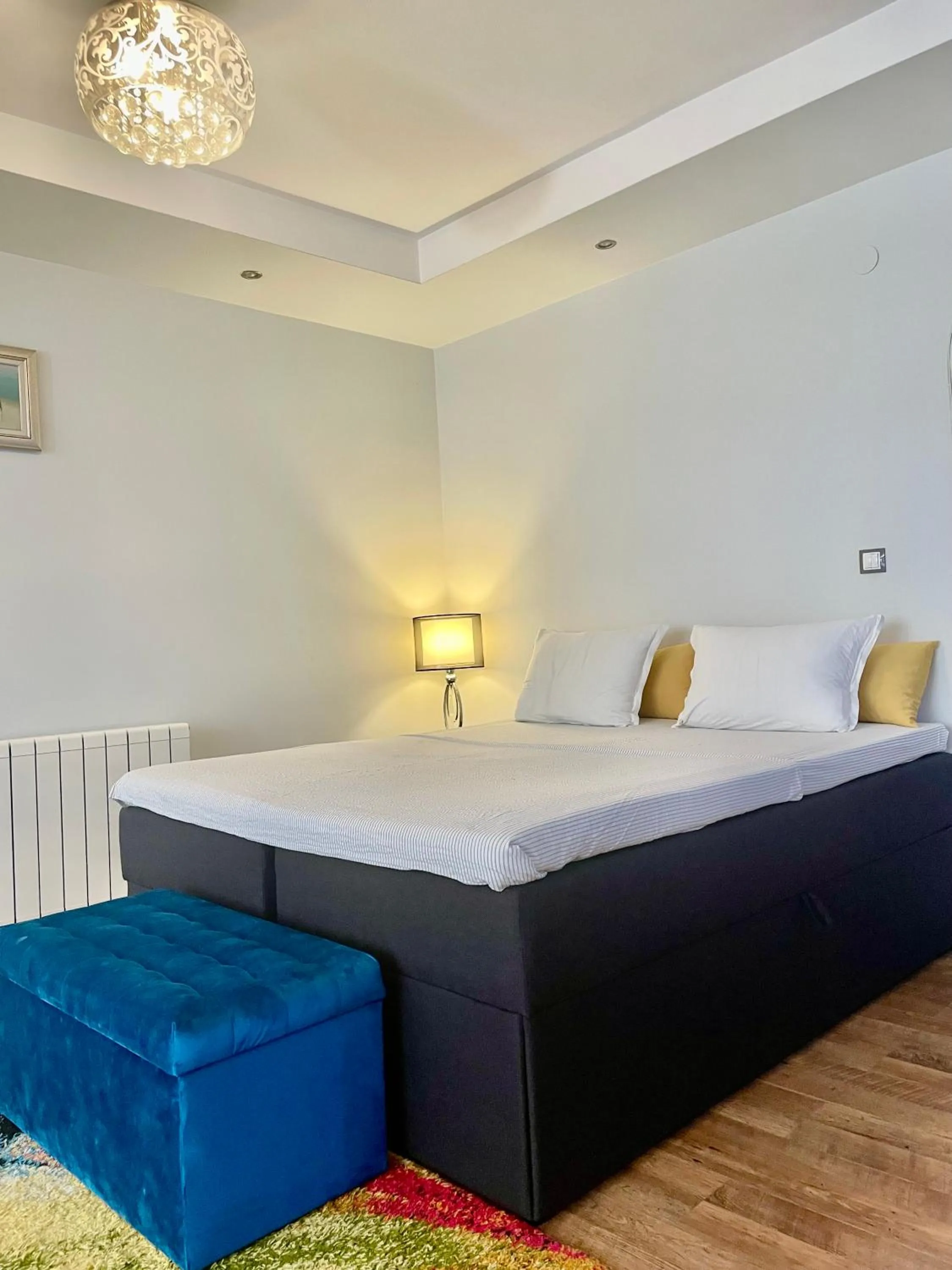 Bed in White Rose Guest Rooms