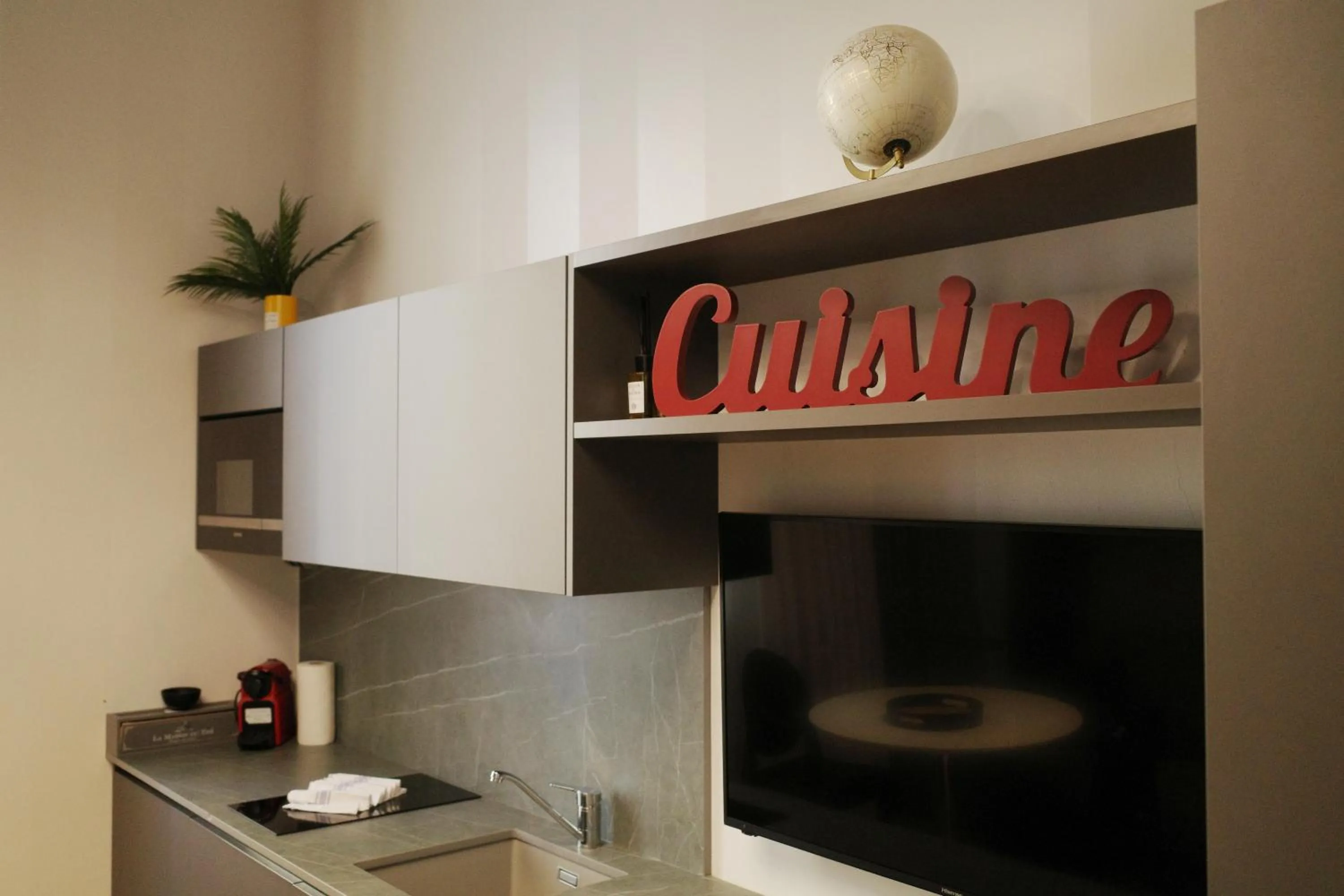 Kitchen or kitchenette in PORTA NUOVA SUITES