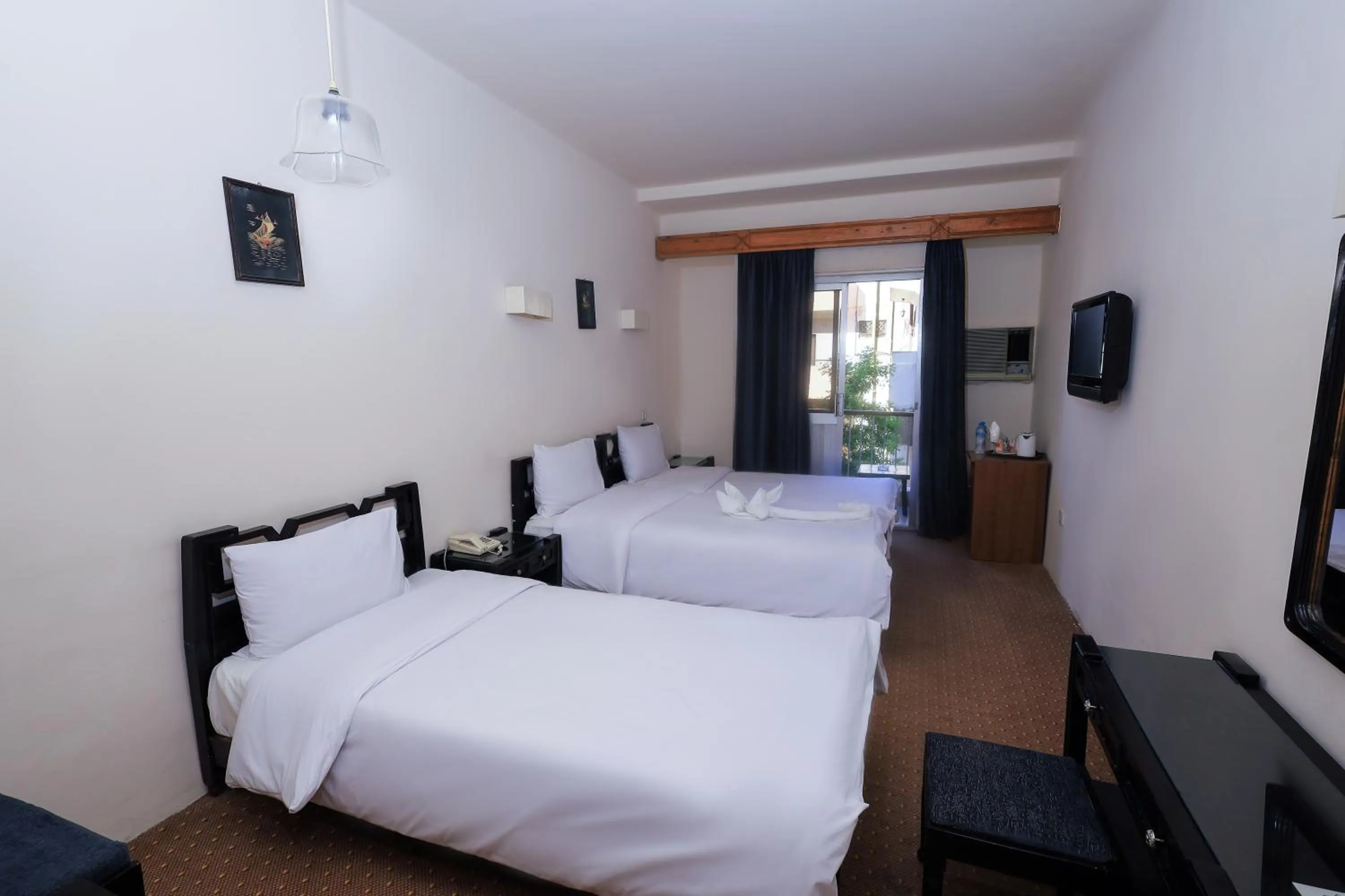 Bed in Cleopatra Hotel