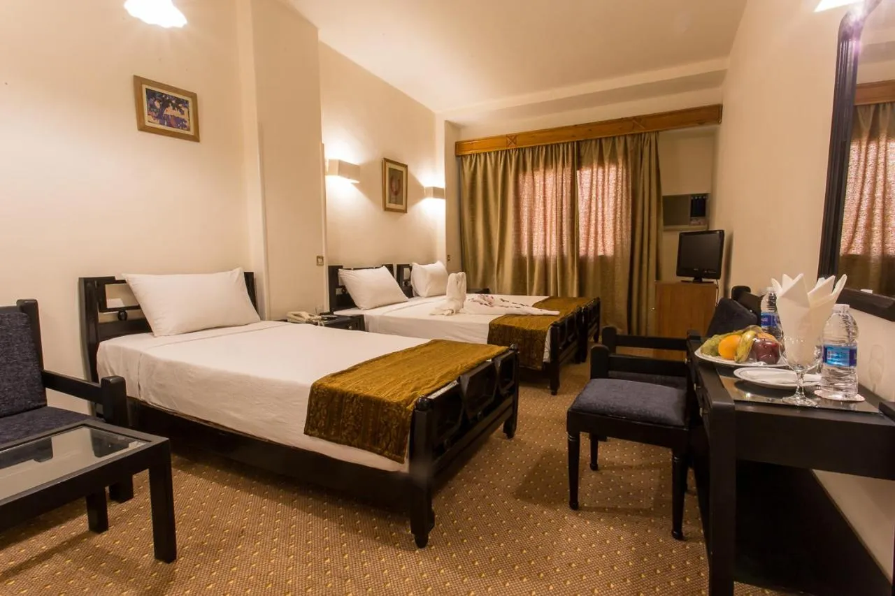 Photo of the whole room, Bed in Cleopatra Hotel