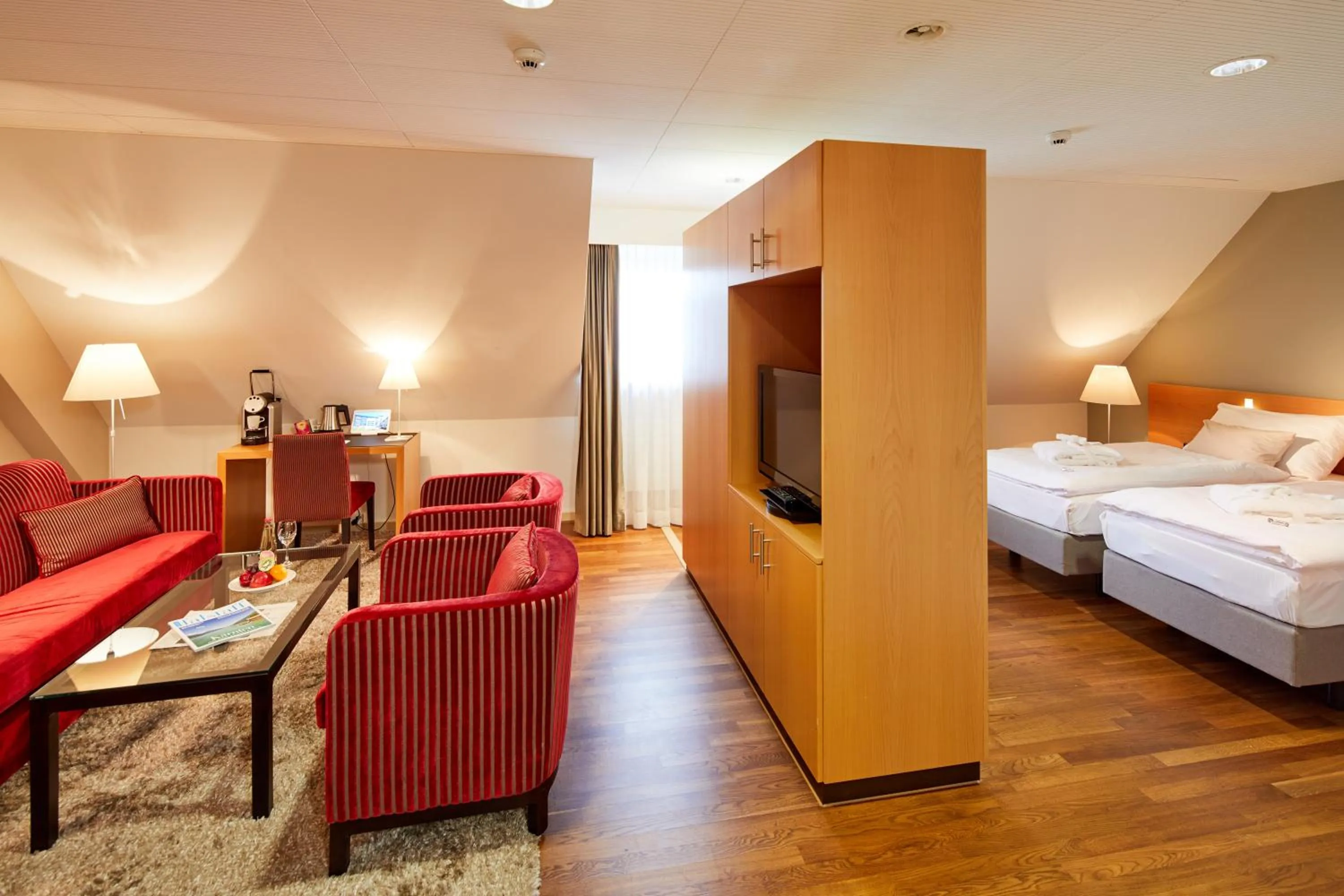 Living room, Bed in Hotel Banana City Winterthur