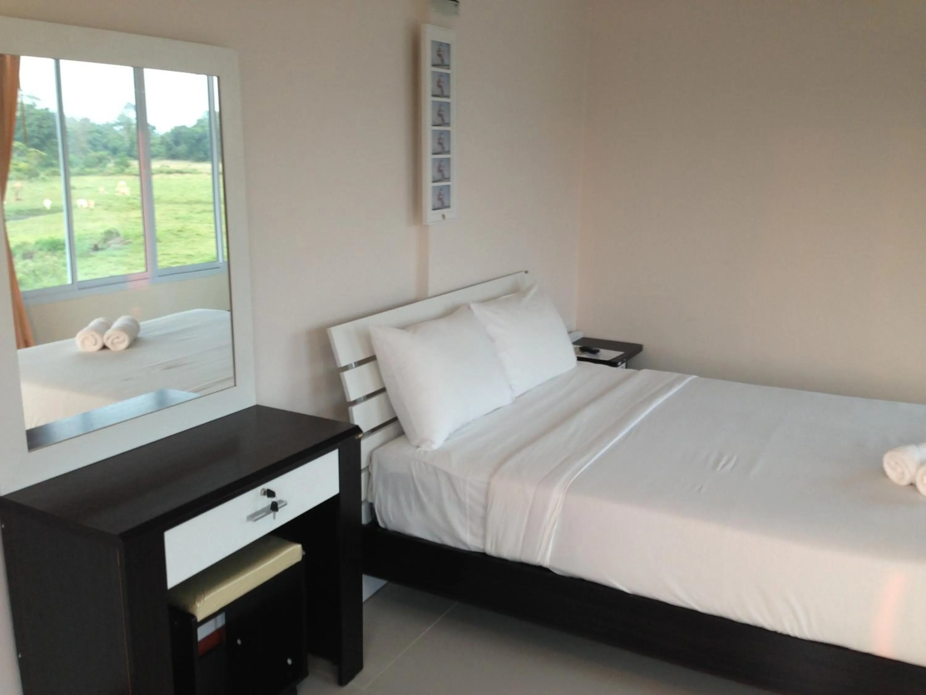 Bed in Siriburi Resort