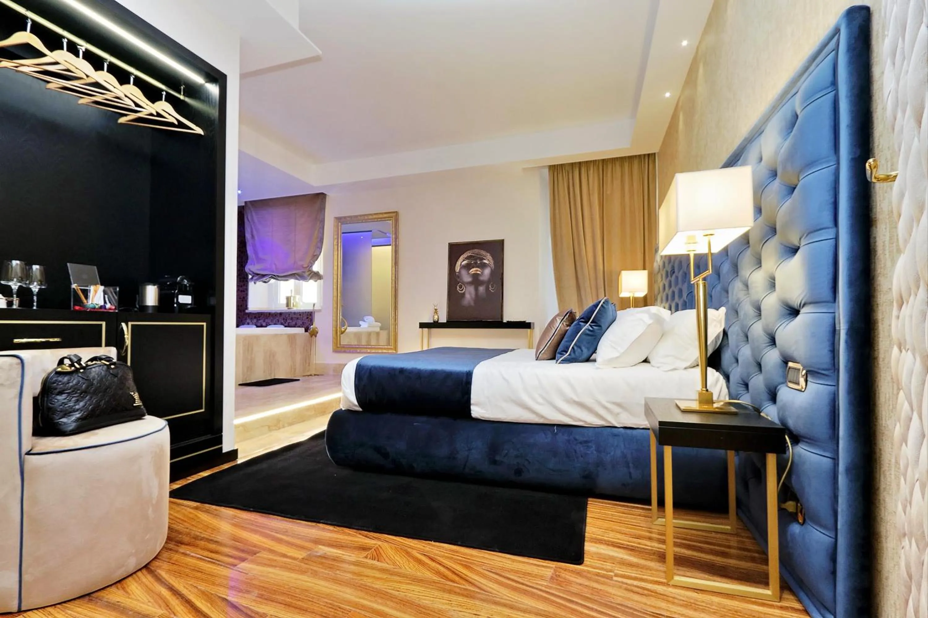 Photo of the whole room, Bed in Spanish Diamond Luxury Suites & Jacuzzi