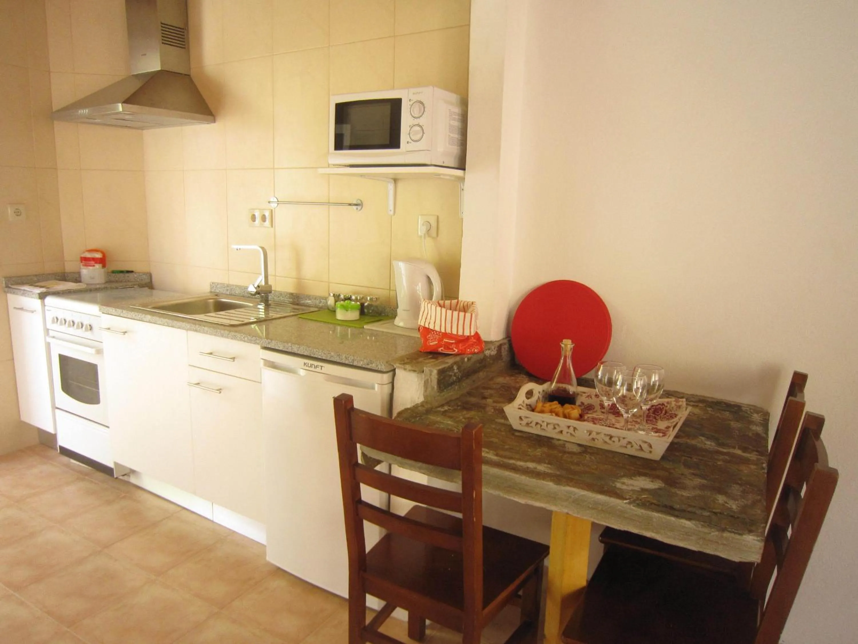 Kitchen or kitchenette in Casas Botelho Elias