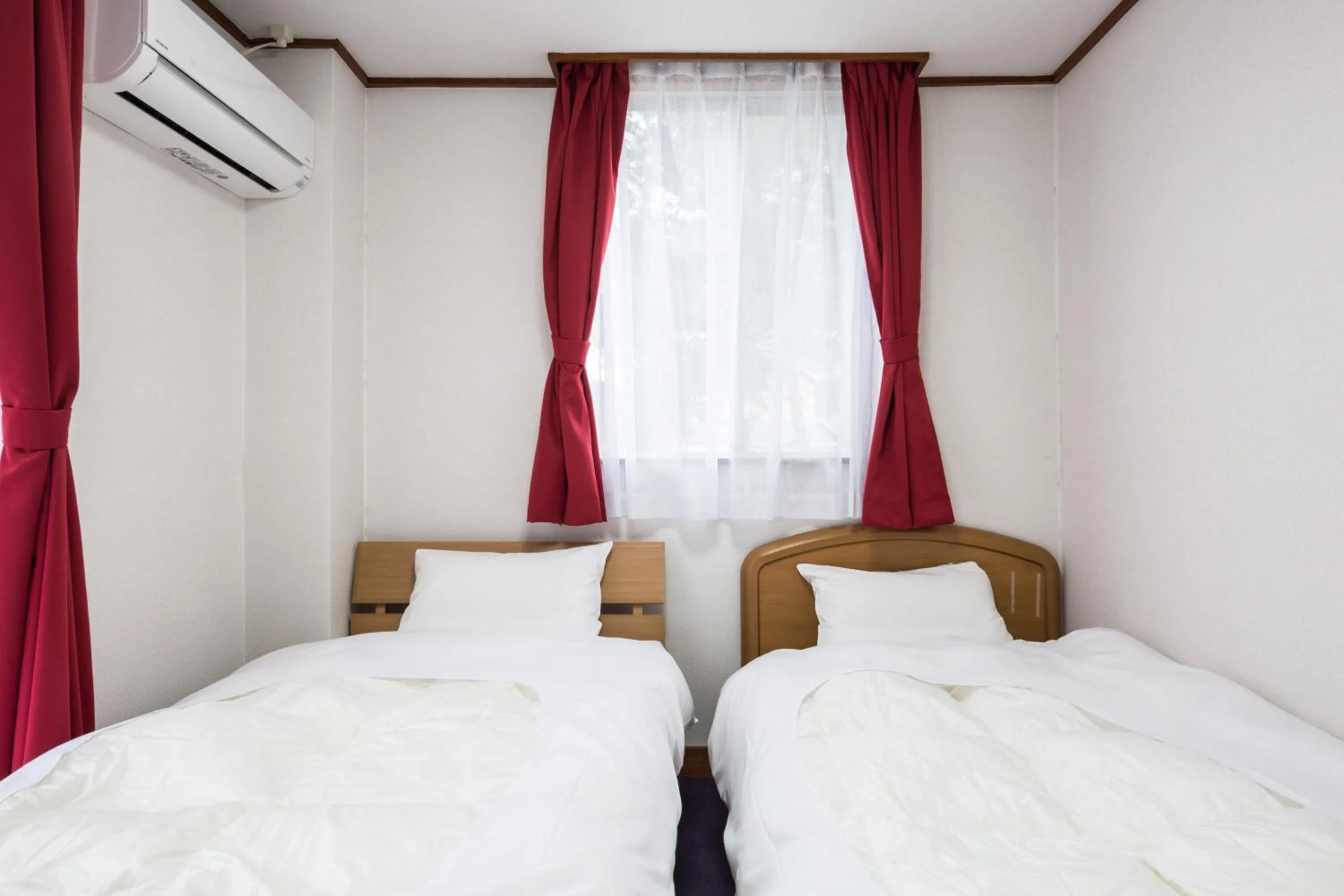 Bed in Kinugawa Pension Bamboo