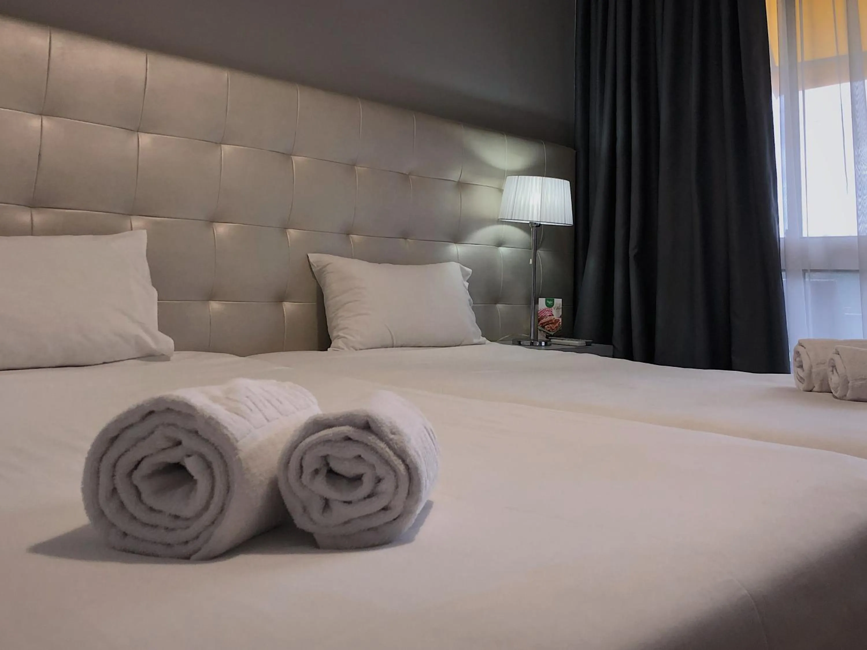 Bed in Vila Hotel By VimaHotels