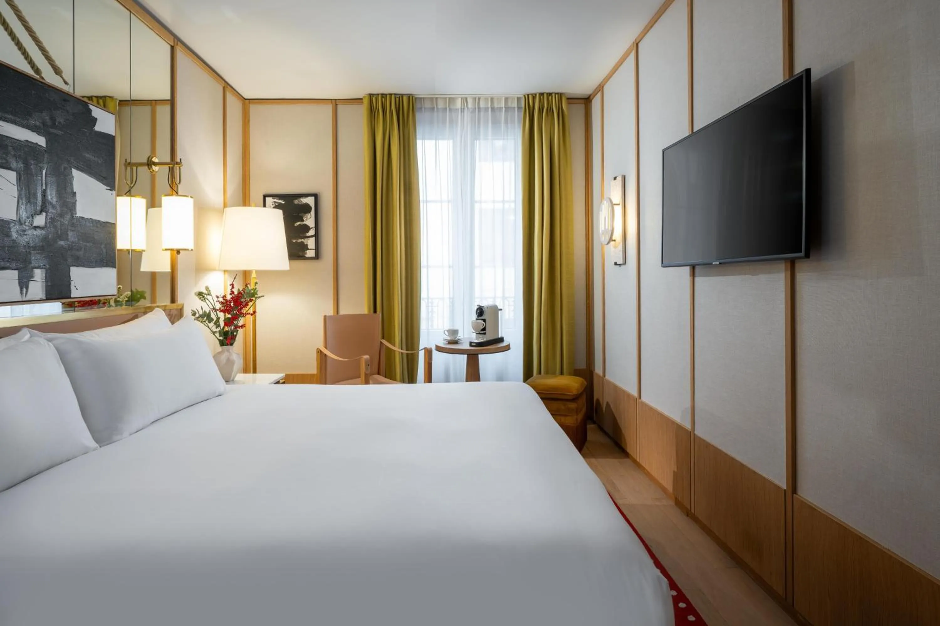 Bed in Le Belgrand Hotel Paris Champs Elysees, Tapestry By Hilton