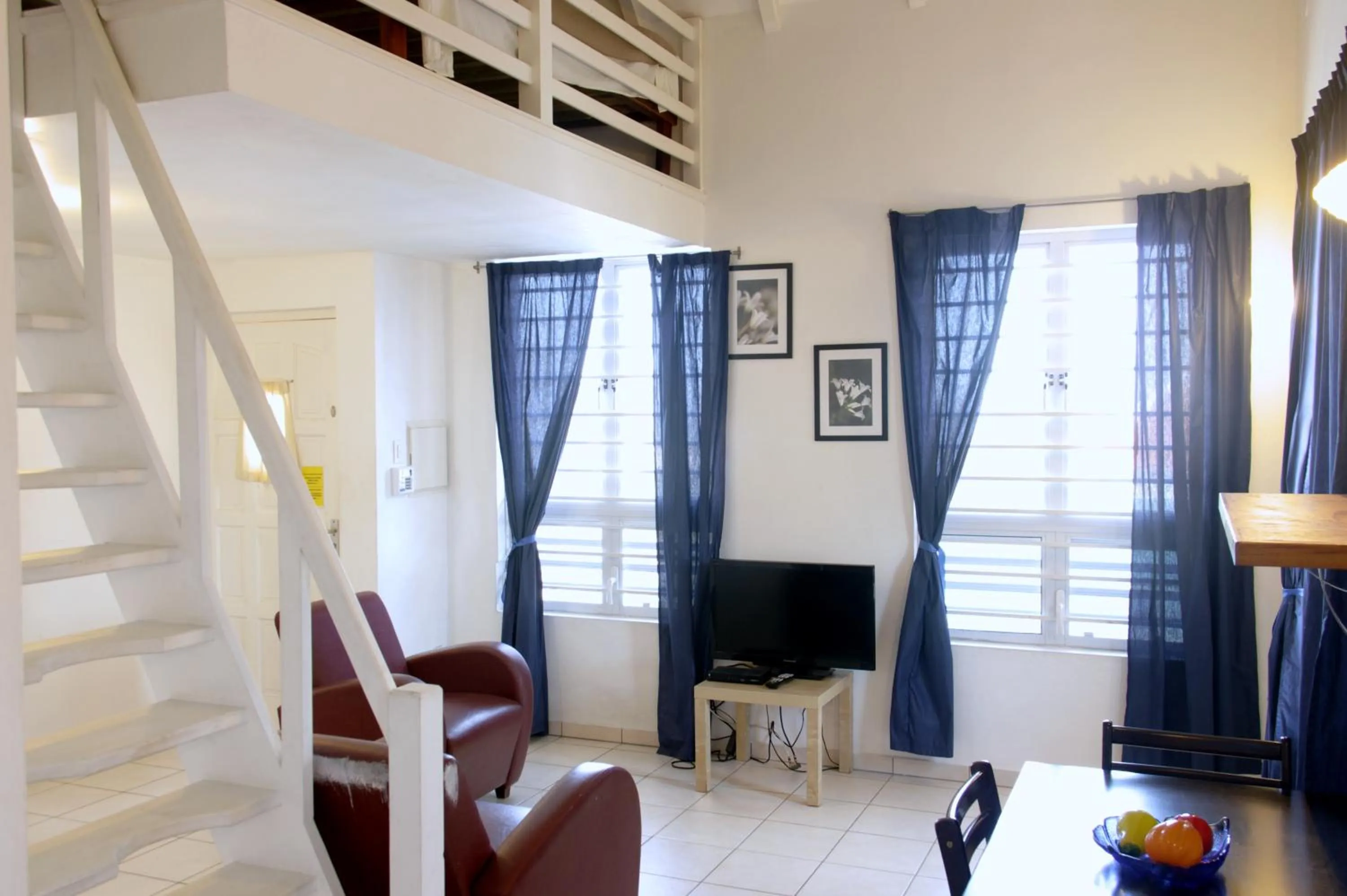 Living room in Orange Rembrandt Studio Apartments