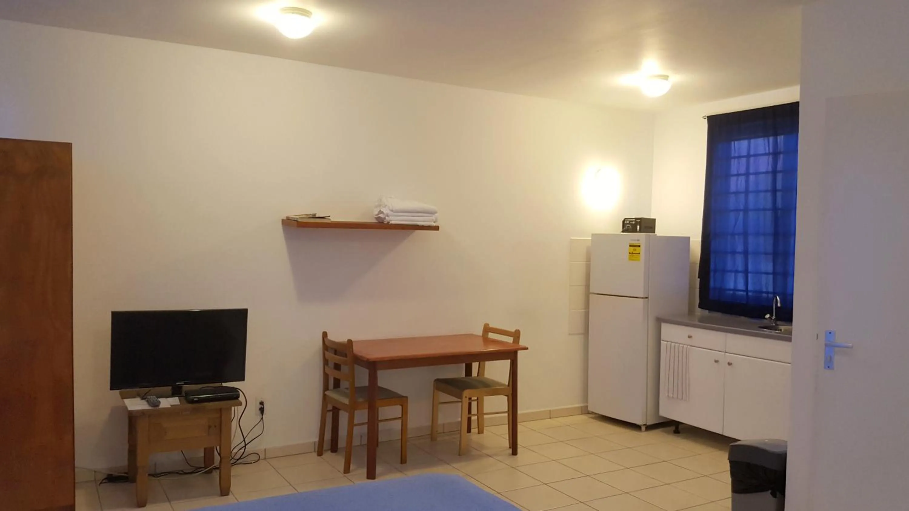 Bedroom in Orange Rembrandt Studio Apartments