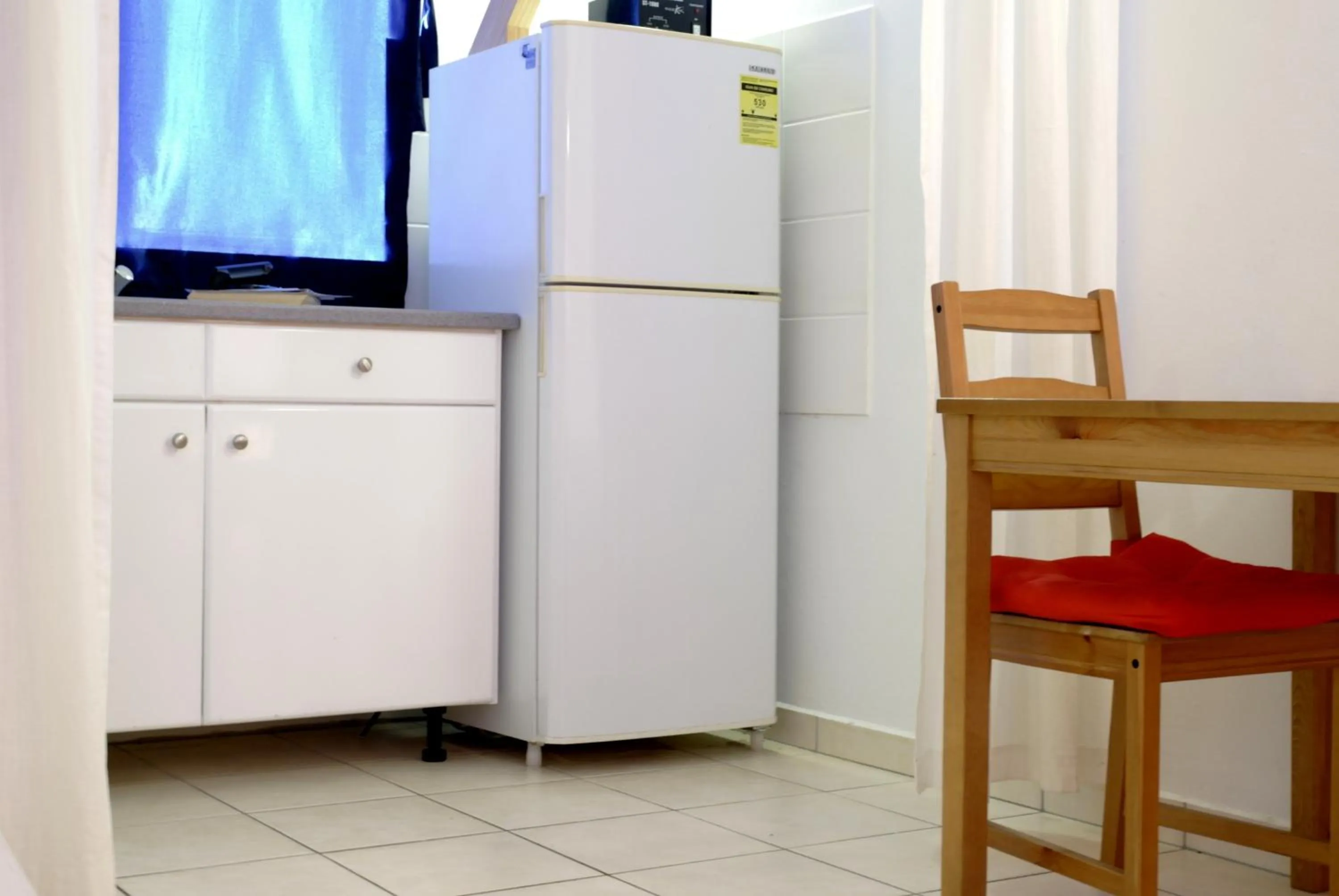 Kitchen or kitchenette in Orange Rembrandt Studio Apartments