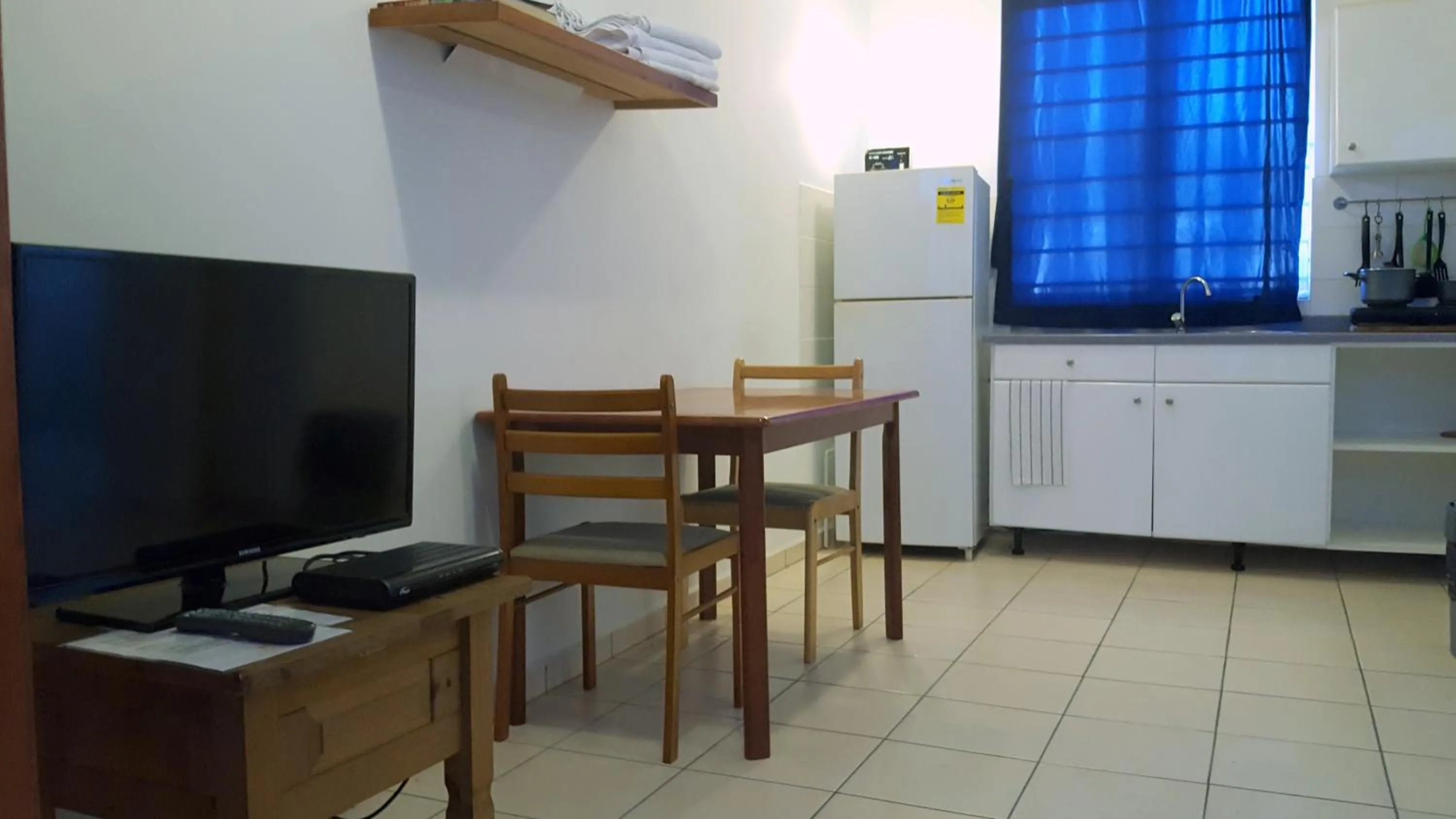 TV and multimedia in Orange Rembrandt Studio Apartments