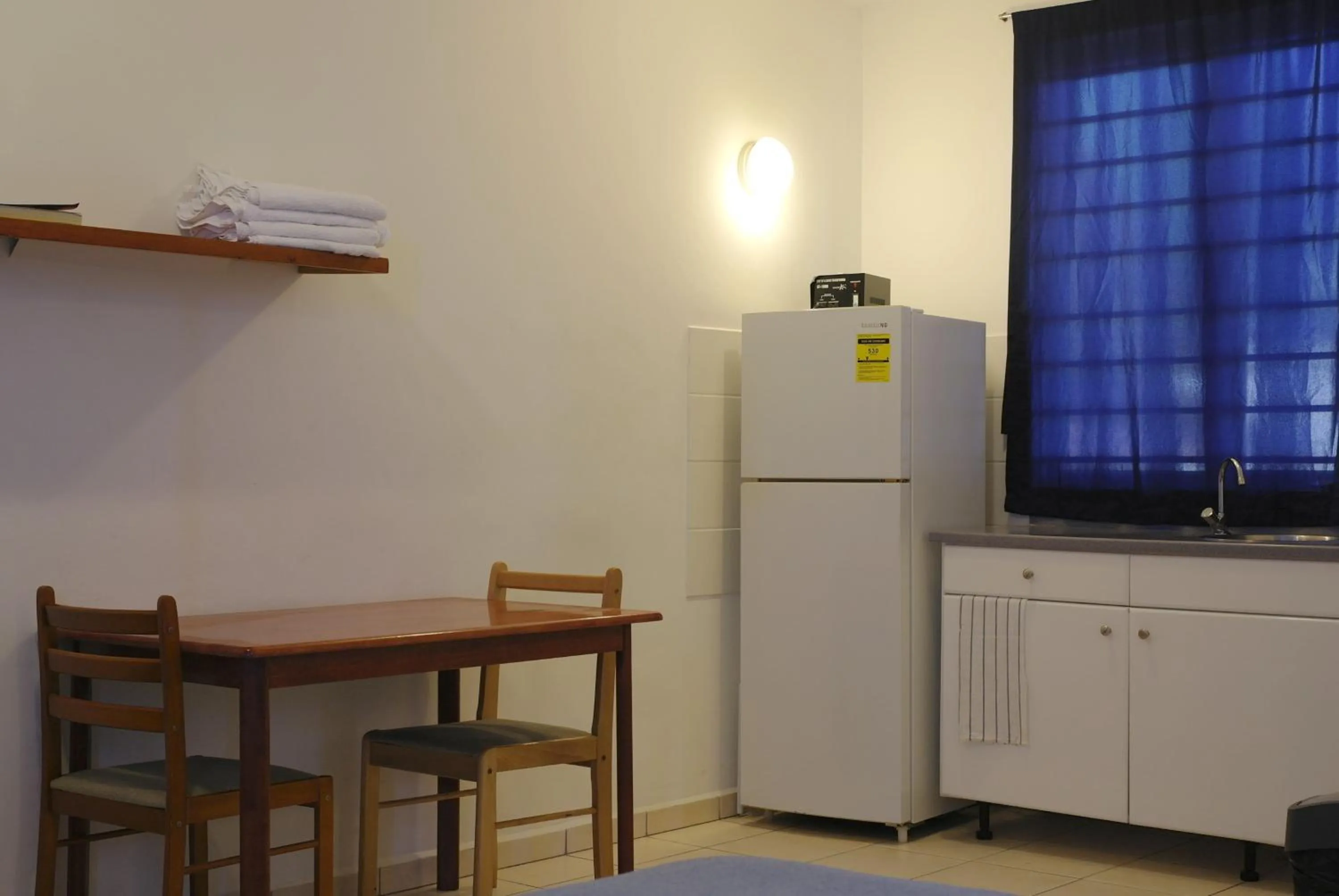 Kitchen or kitchenette in Orange Rembrandt Studio Apartments