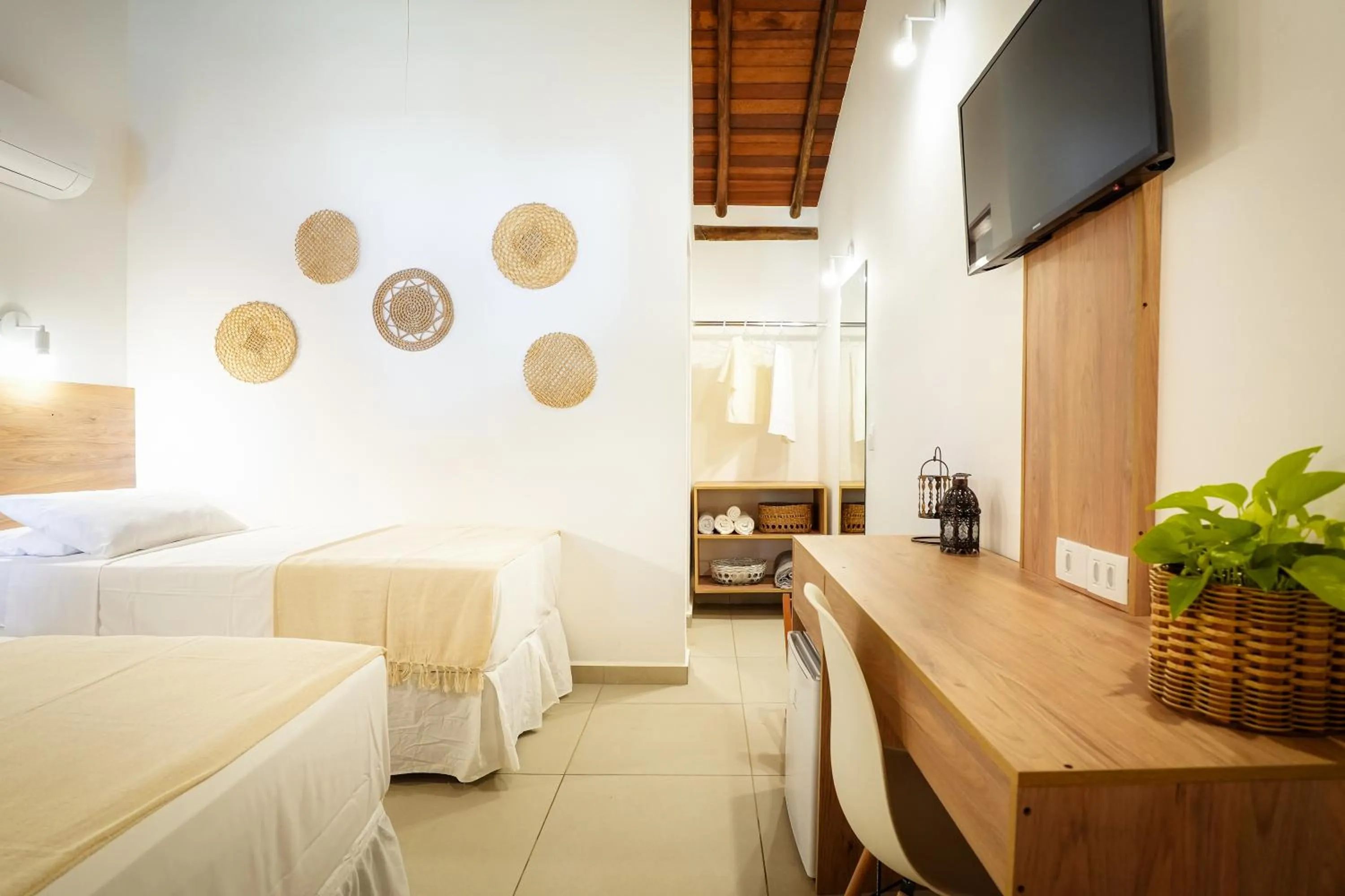 Bed in VELINN Pousada Bromelias