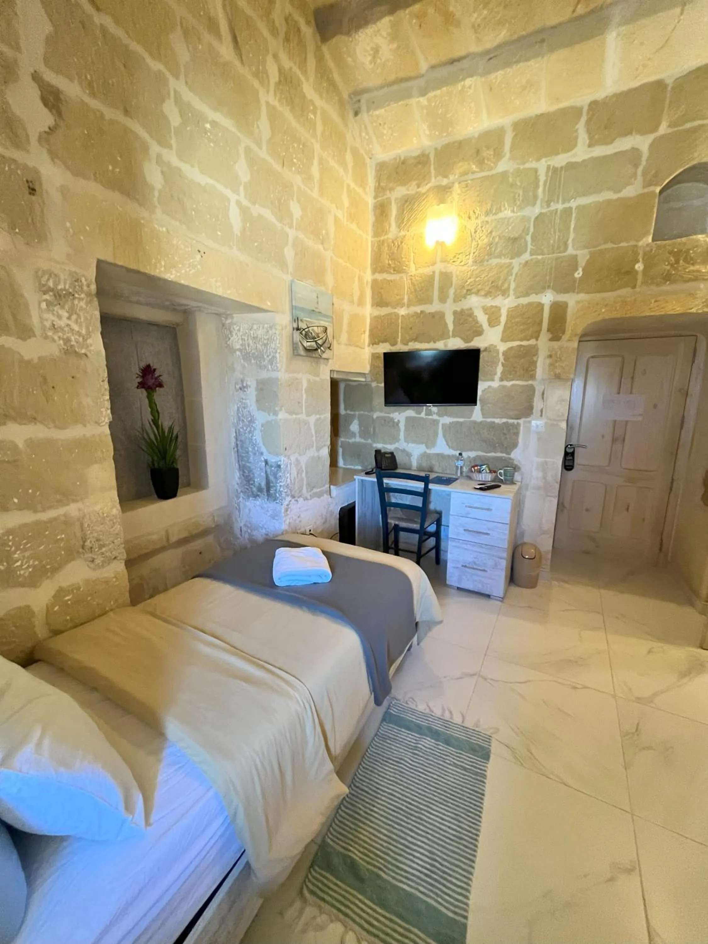 Bedroom in Fiftyfour West Boutique Living