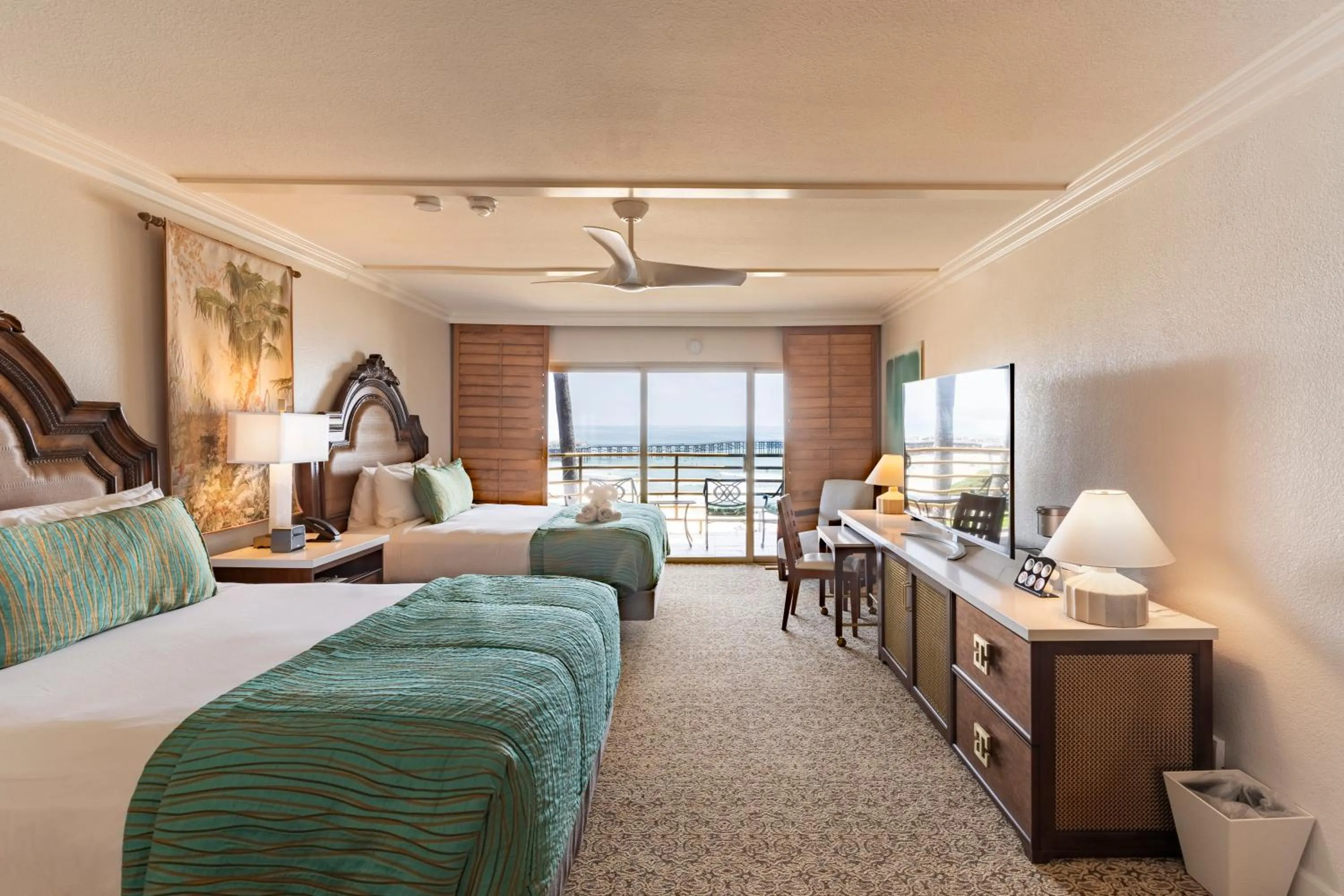 Bed in Pacific Terrace Hotel