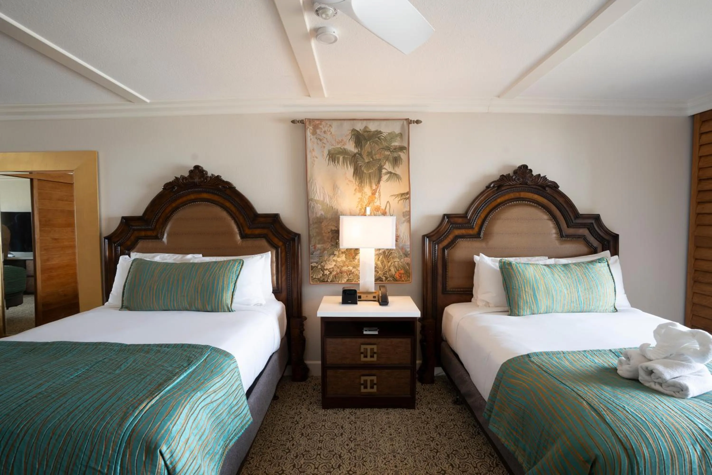 Bed in Pacific Terrace Hotel