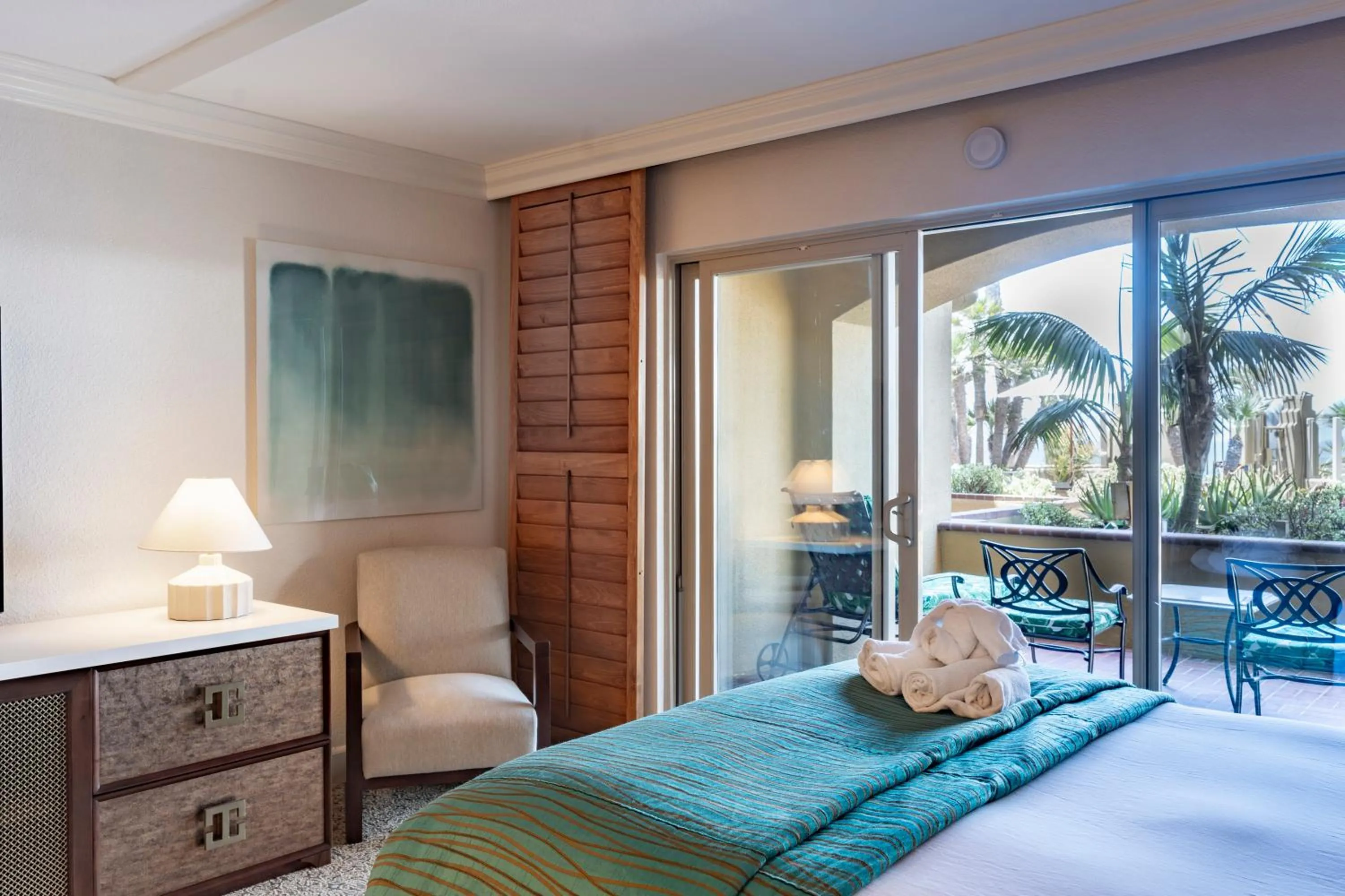 Bed in Pacific Terrace Hotel