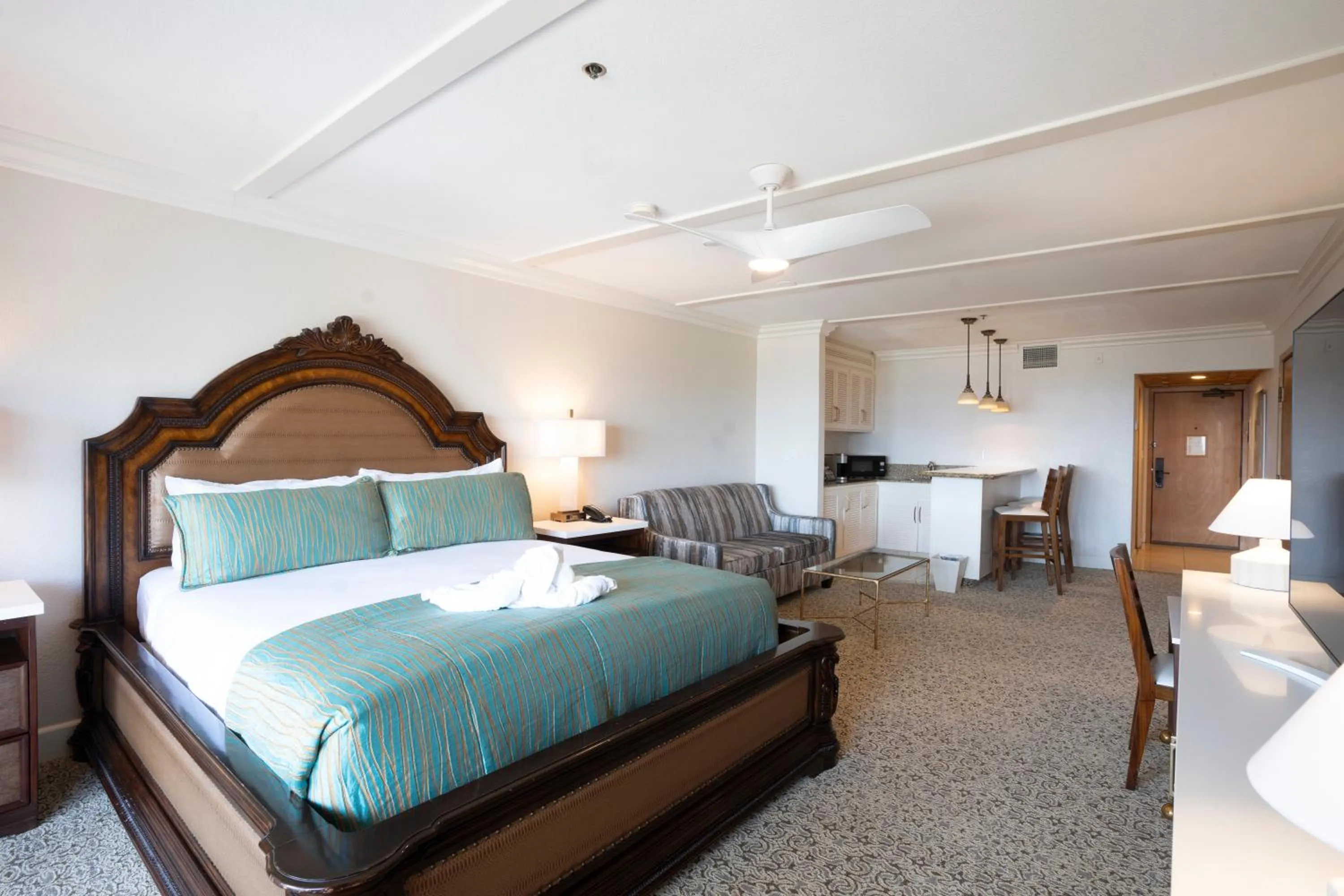 Bed in Pacific Terrace Hotel