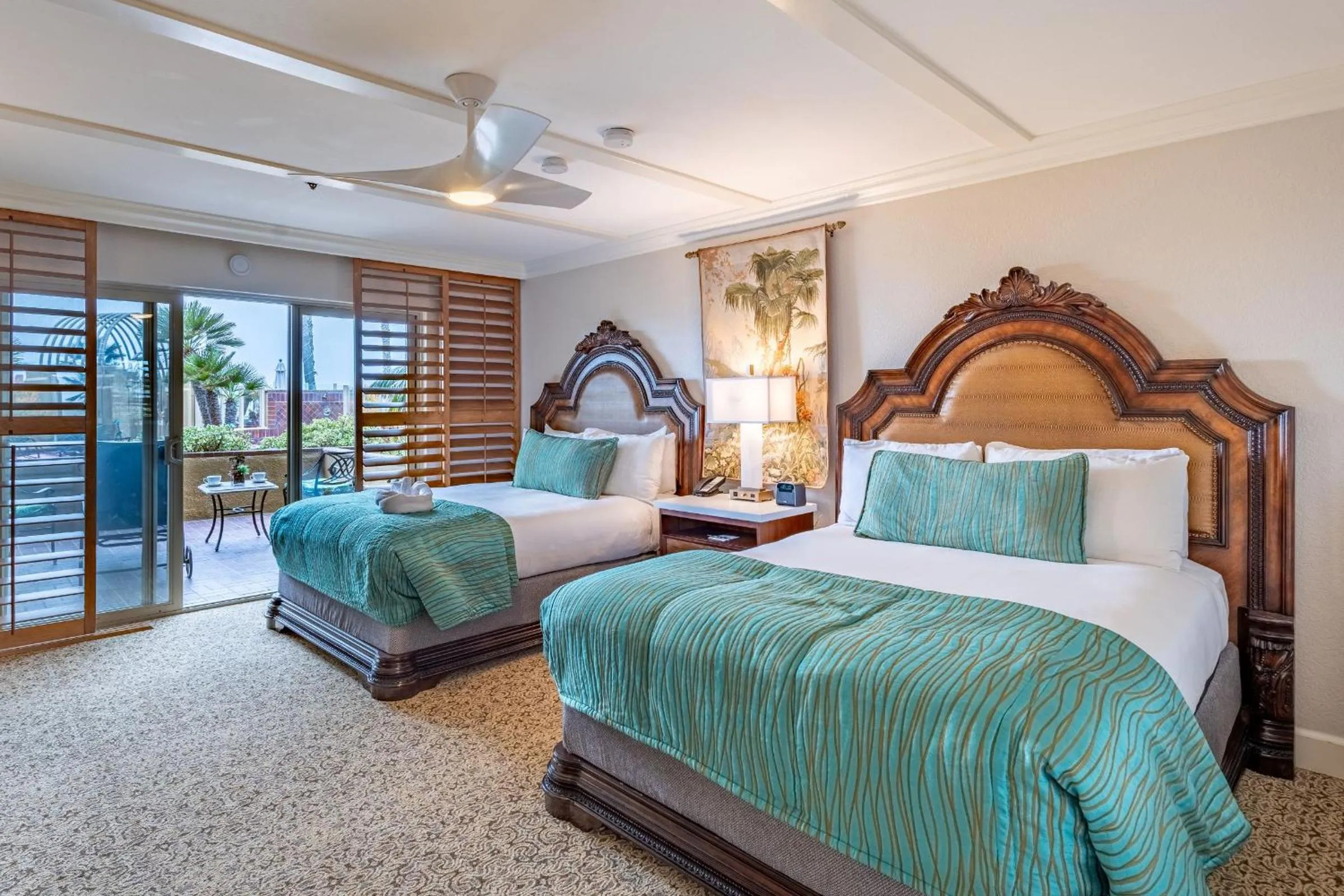 Bed in Pacific Terrace Hotel