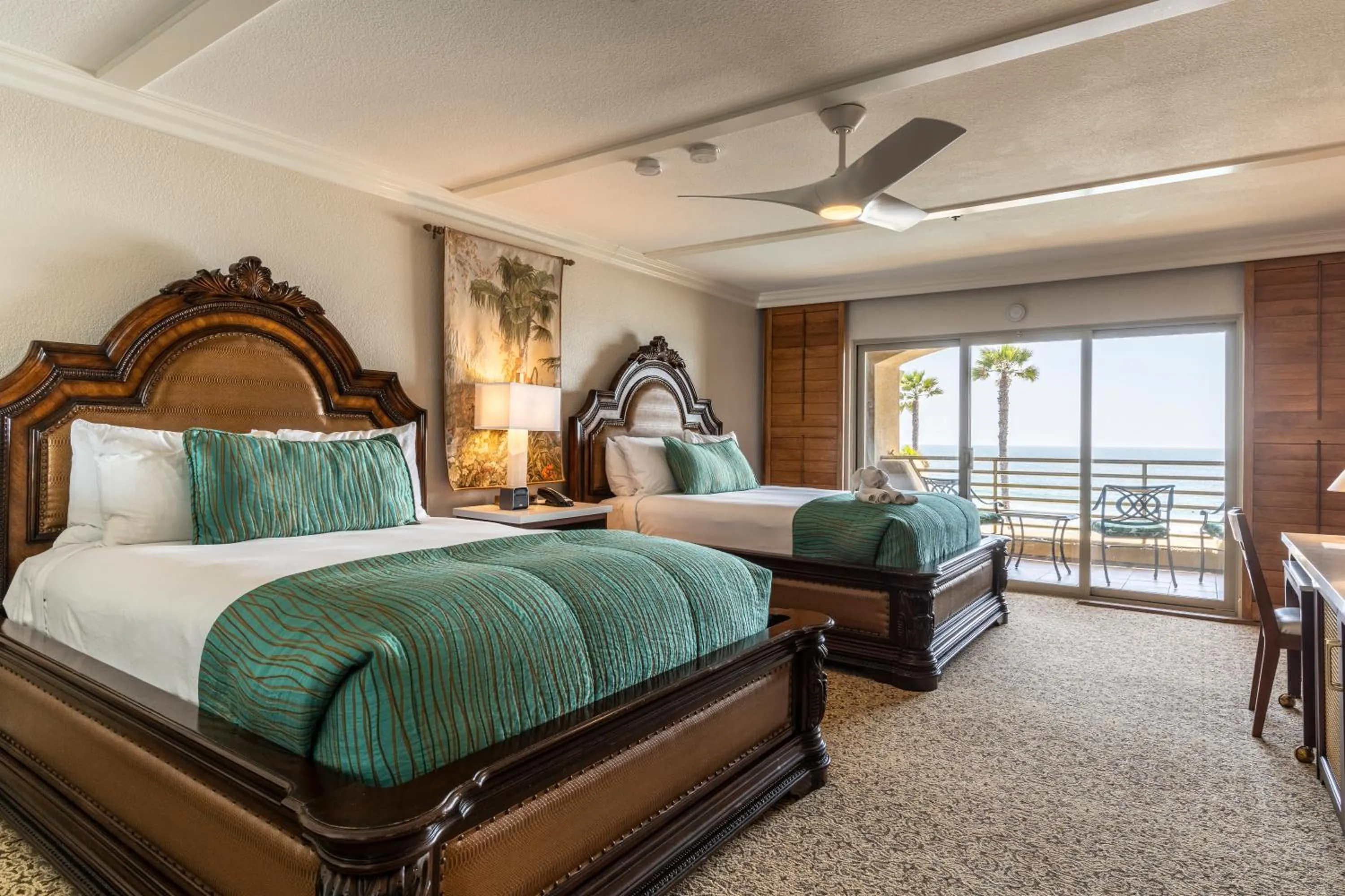 Bed in Pacific Terrace Hotel