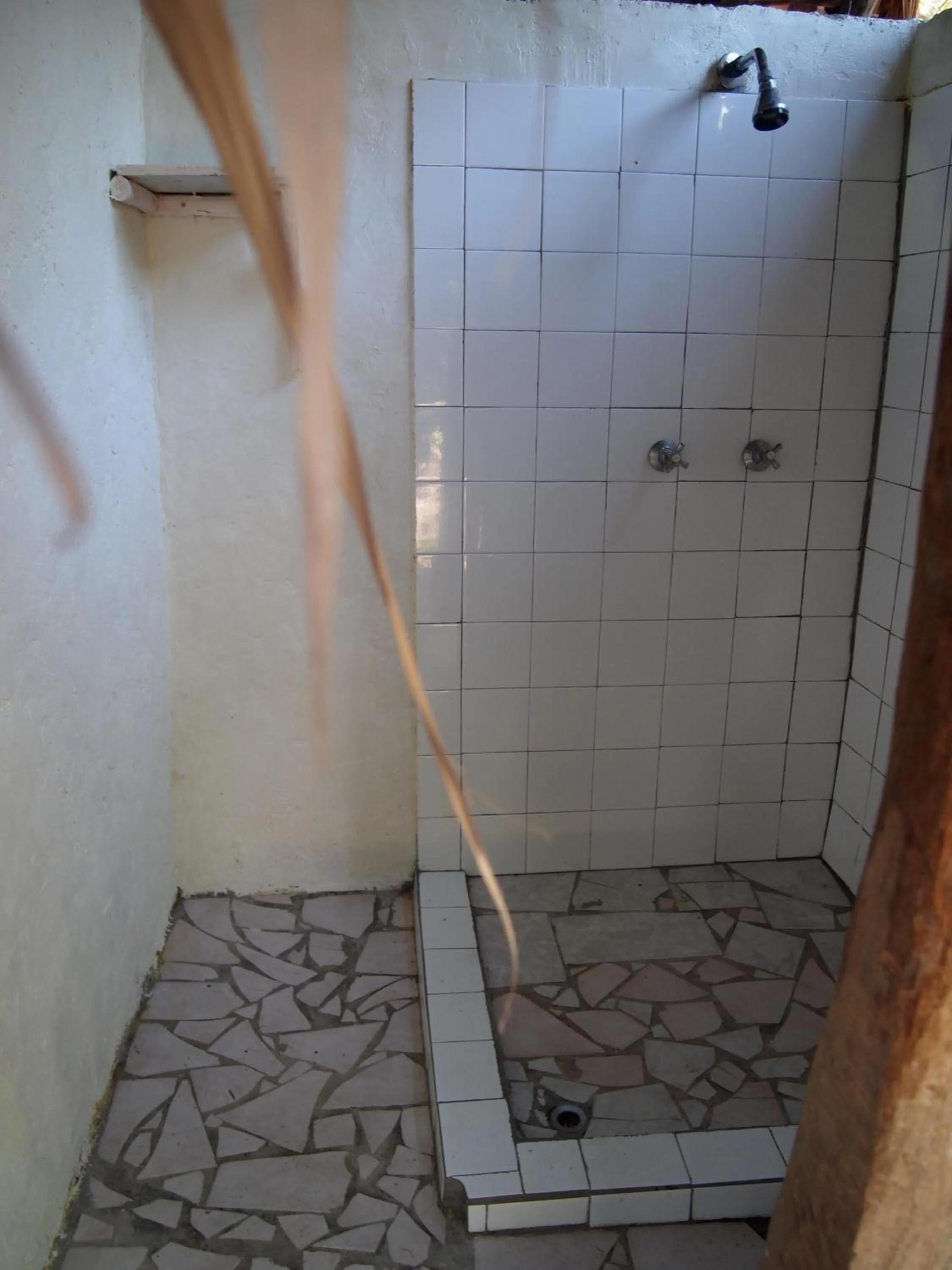 Shower in Tranquility Island Eco Dive Resort