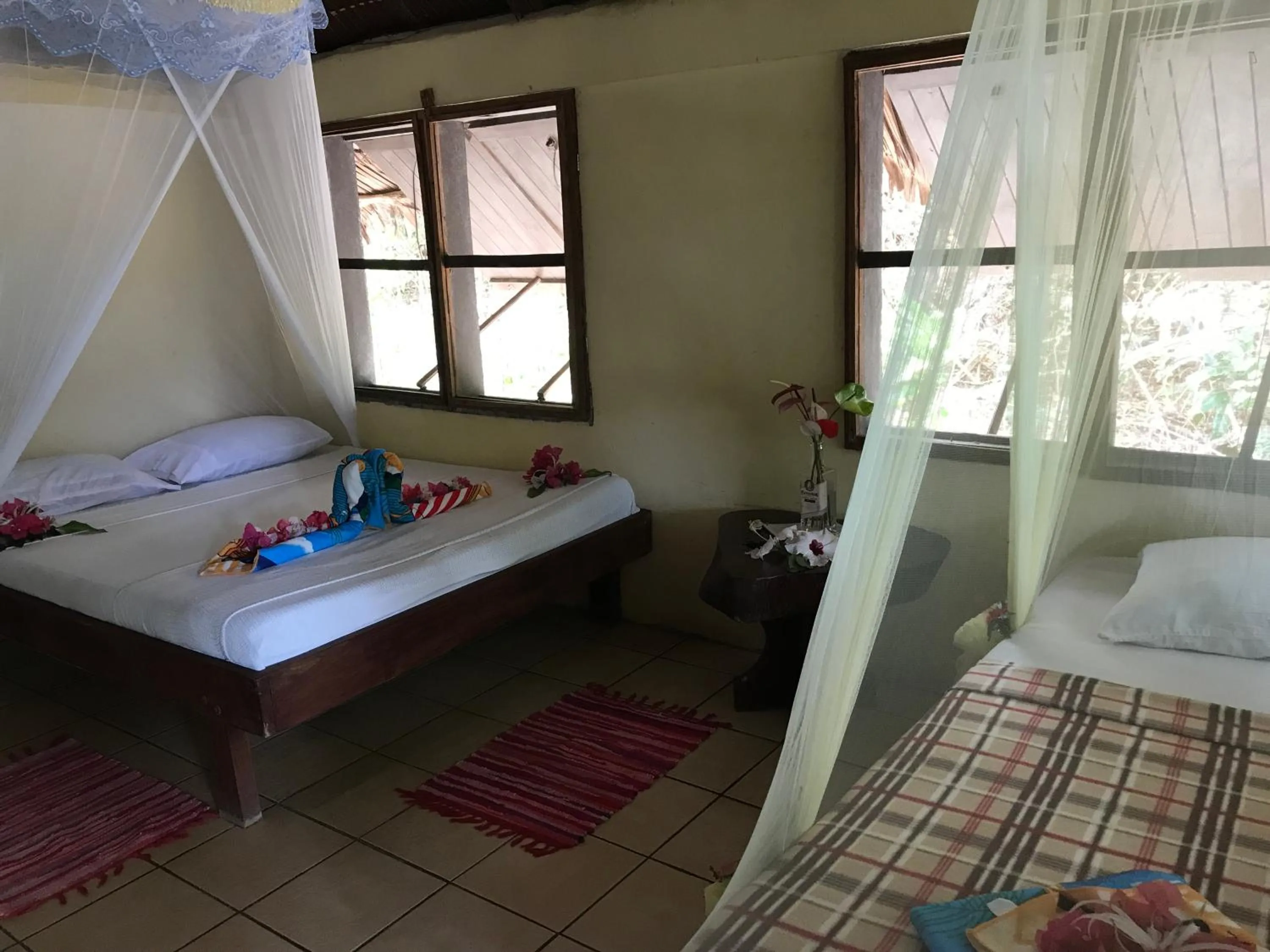 Bedroom, Bed in Tranquility Island Eco Dive Resort