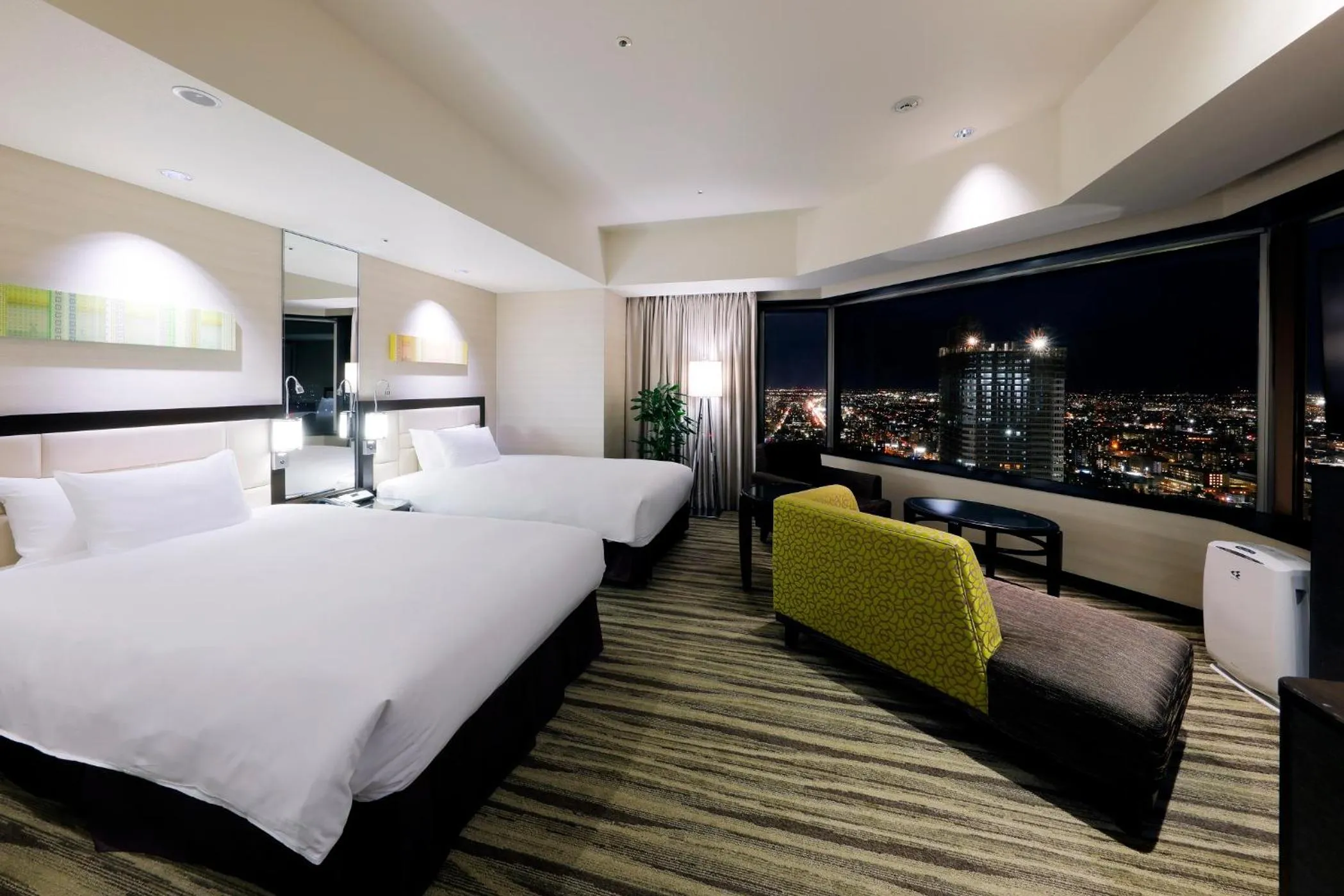 Photo of the whole room, Bed in JR Tower Hotel Nikko Sapporo