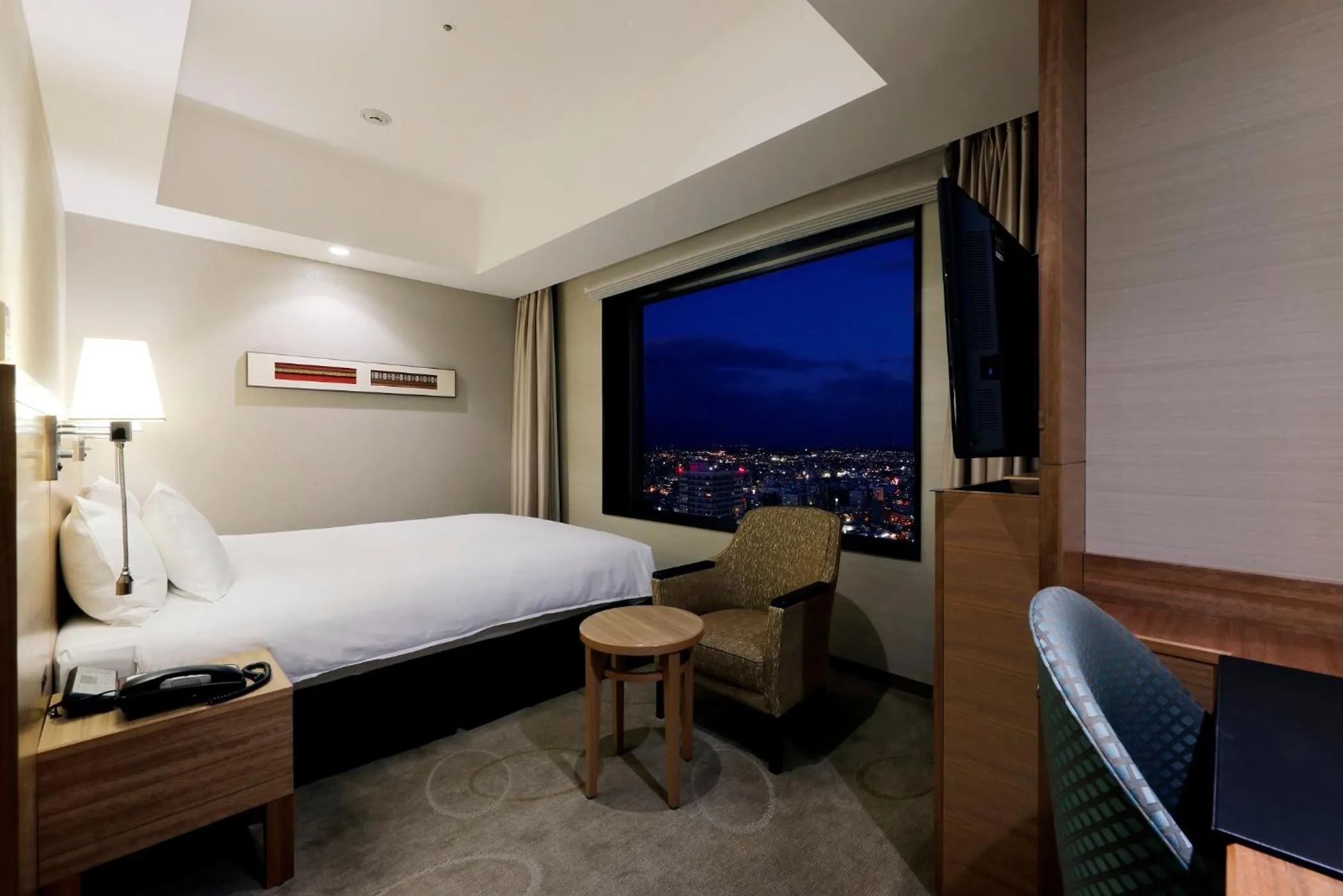 Photo of the whole room, Bed in JR Tower Hotel Nikko Sapporo