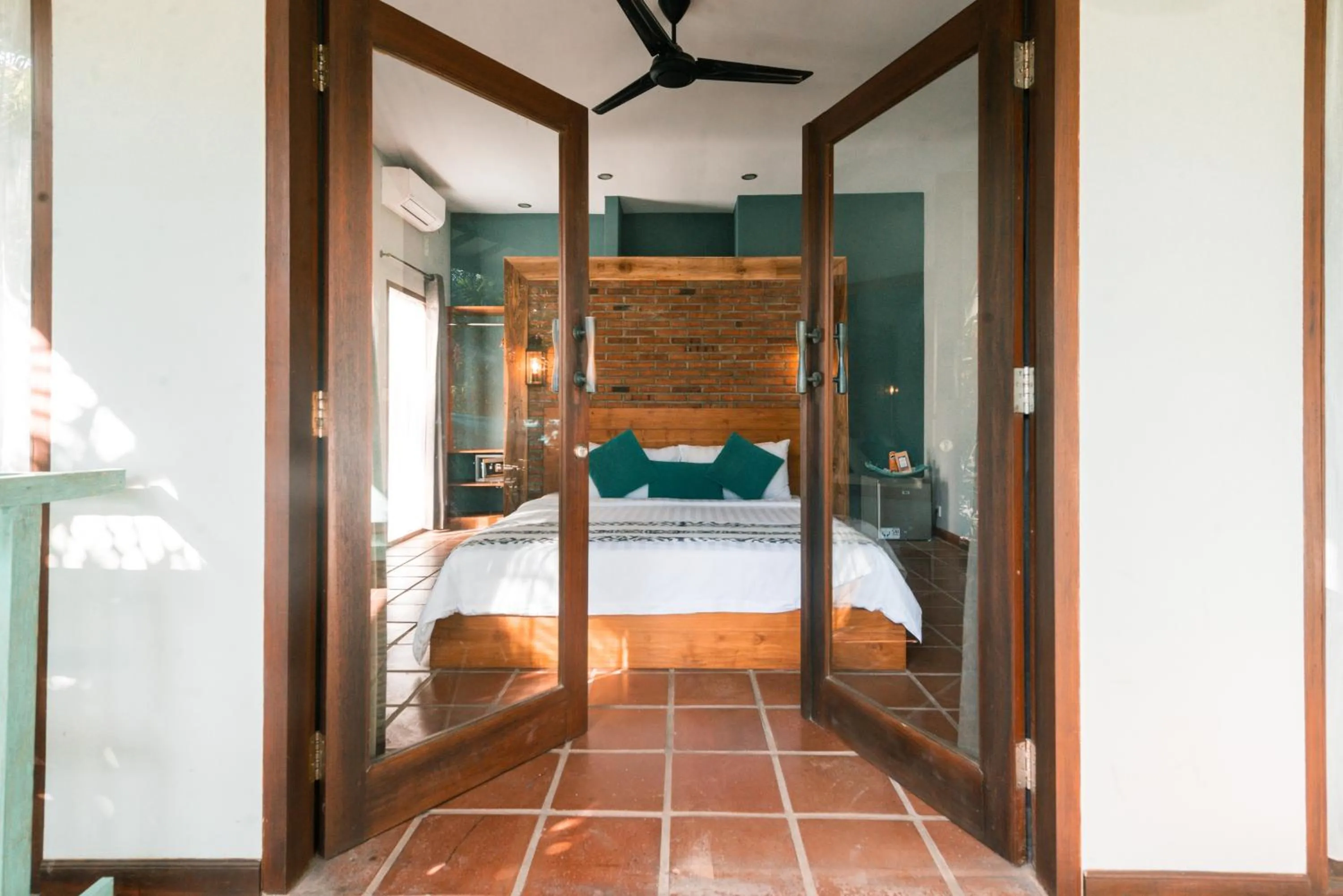 Facade/entrance, Bed in Coconut Garden Resort