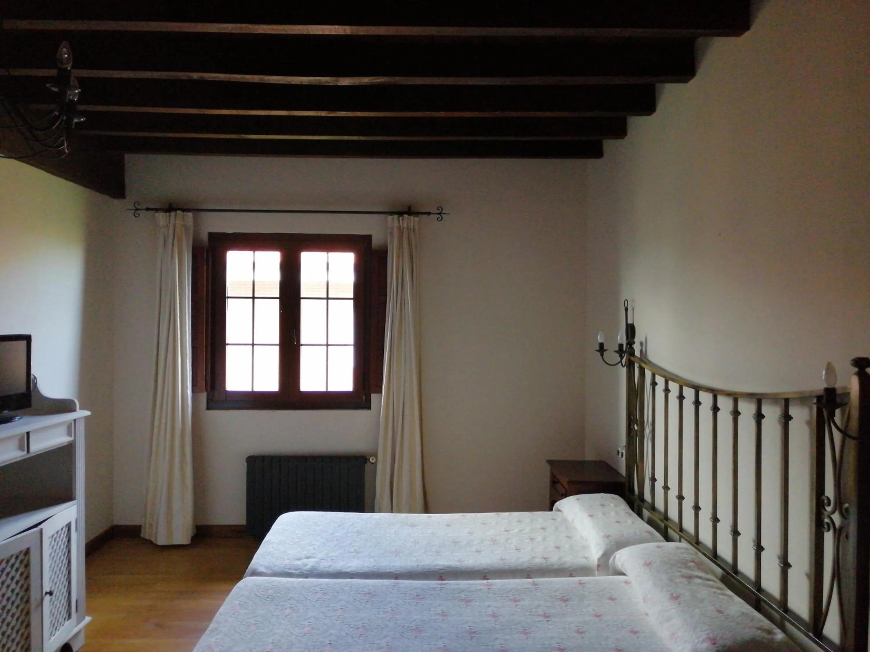Bed in Posada El Jardin de Angela