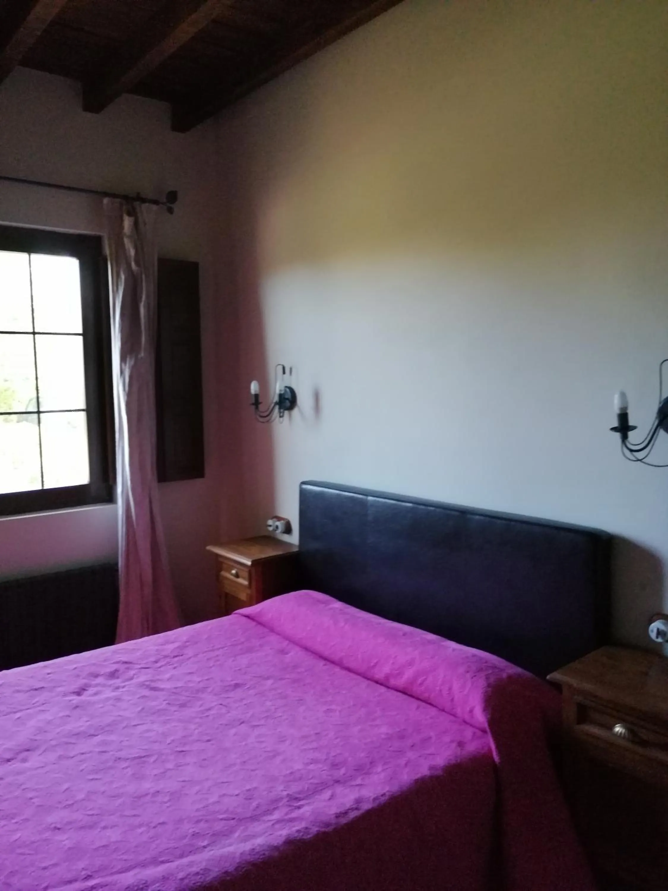 Bed in Posada El Jardin de Angela