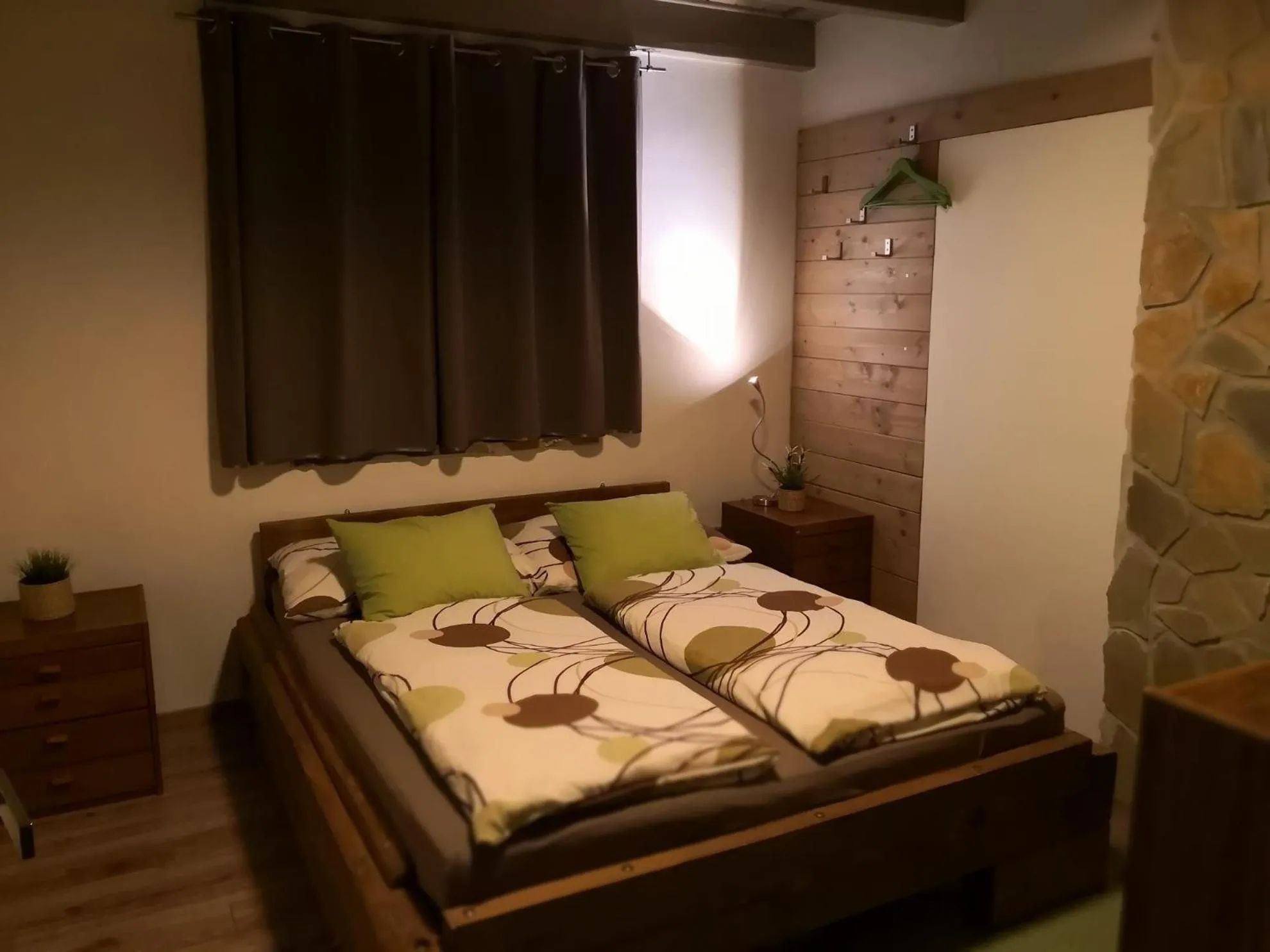 Photo of the whole room, Bed in Apartmany Janosikove diery