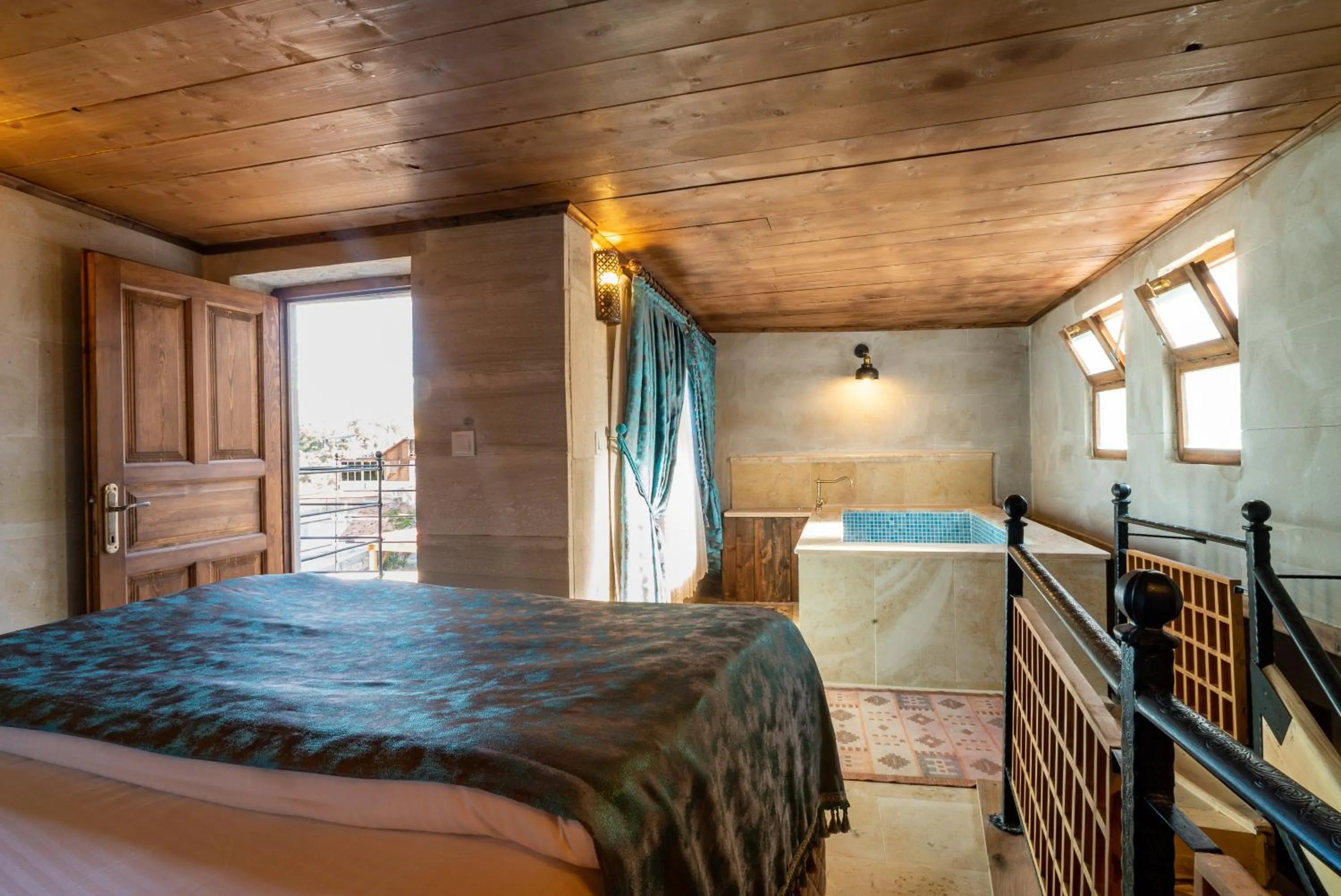 Hot Tub, Bed in Atilla's Cave Hotel