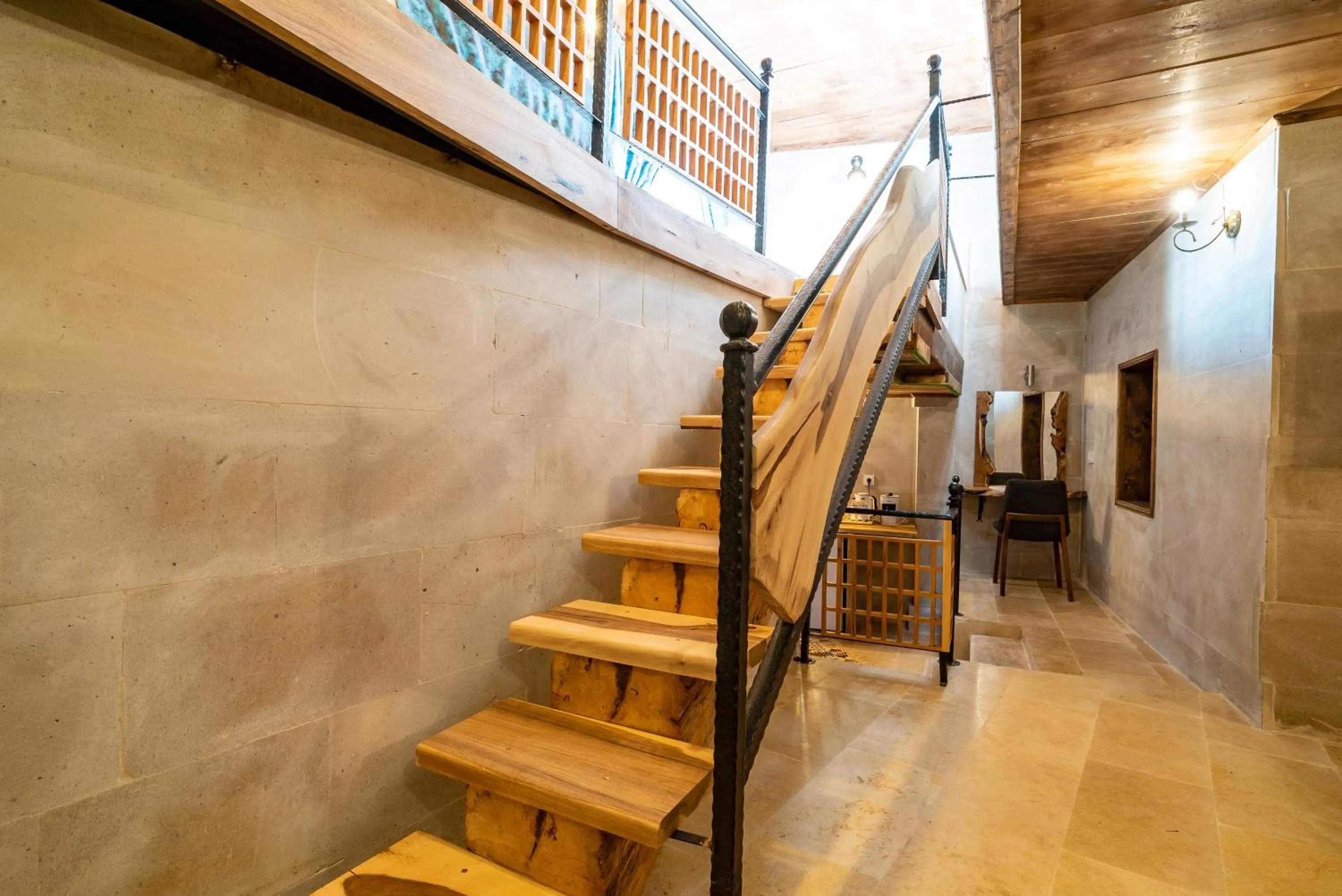 Communal lounge/ TV room in Atilla's Cave Hotel