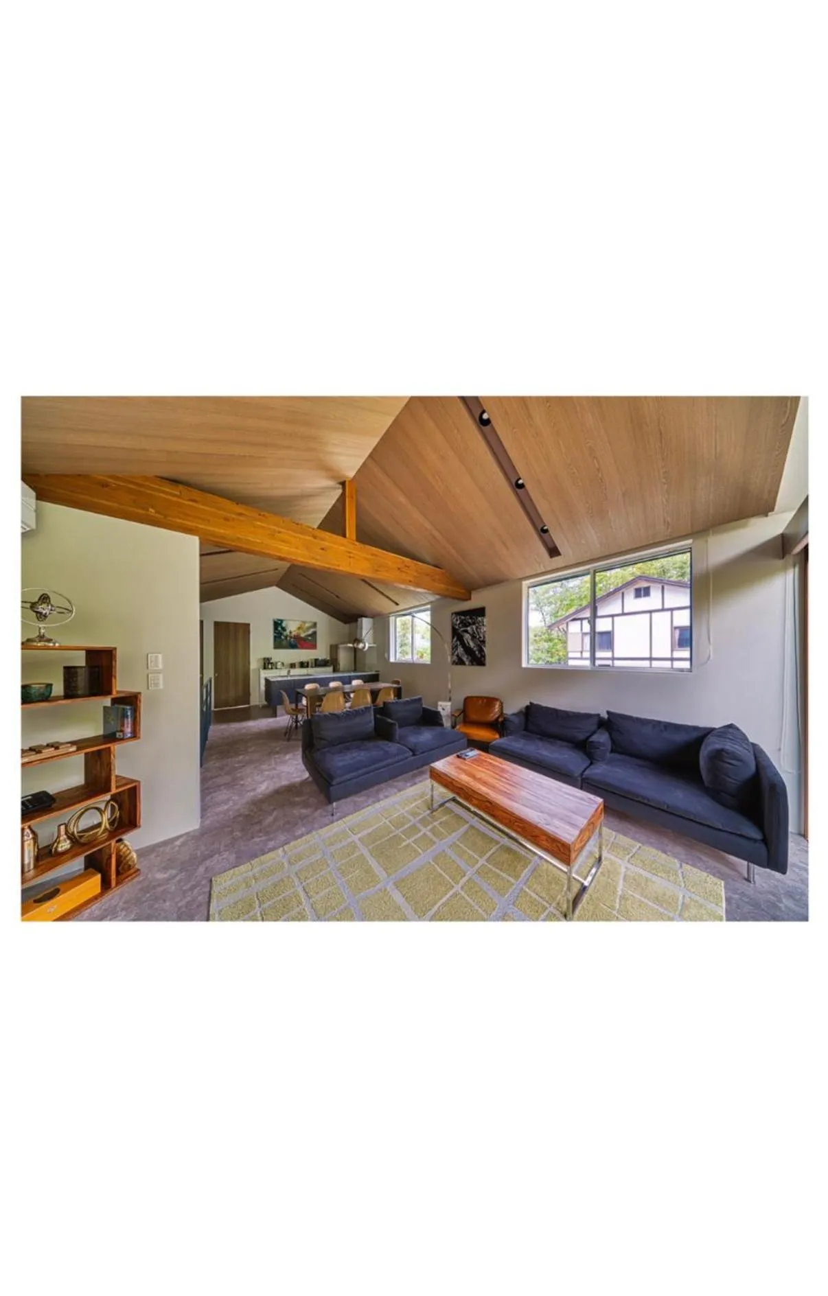 Living room in Grey Wolf Chalet by Hakuba White Fox Company