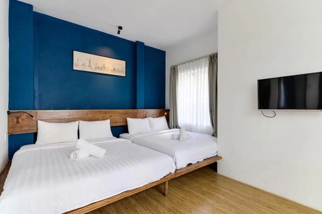 Photo of the whole room, Bed in Leaf Signature Hotel - Lá Group