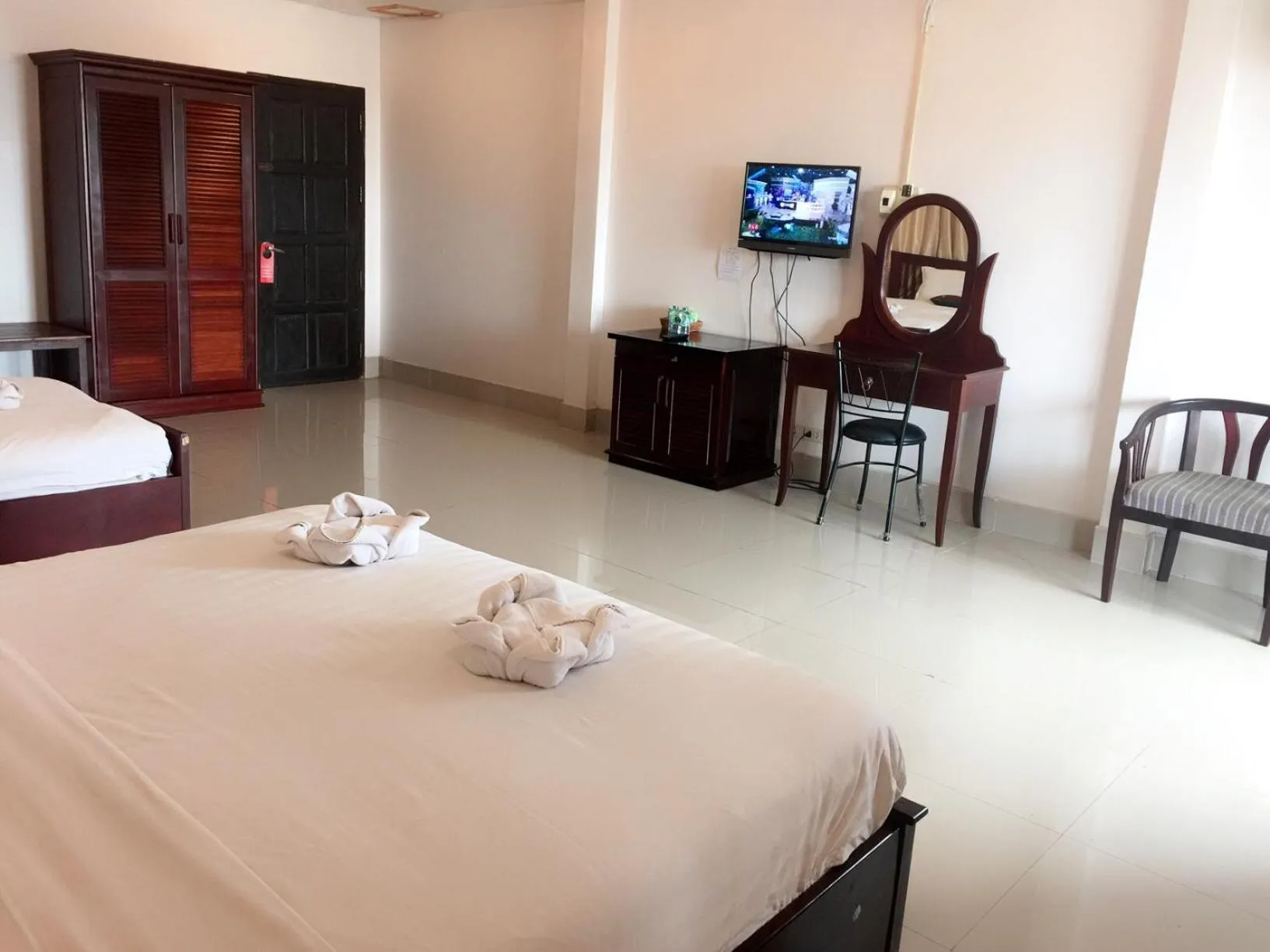 Bed in Vientiane SP Hotel