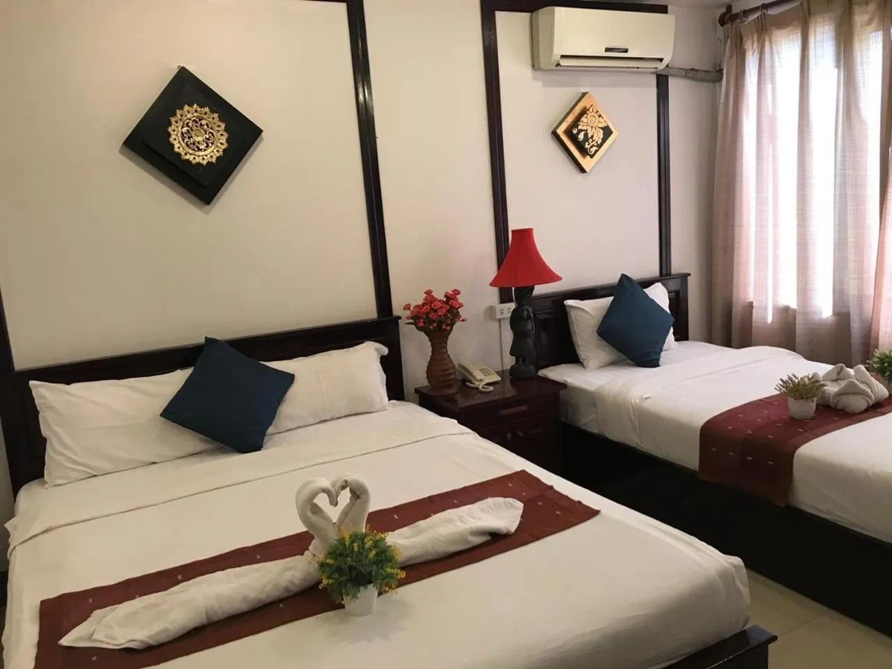 Bed in Vientiane SP Hotel