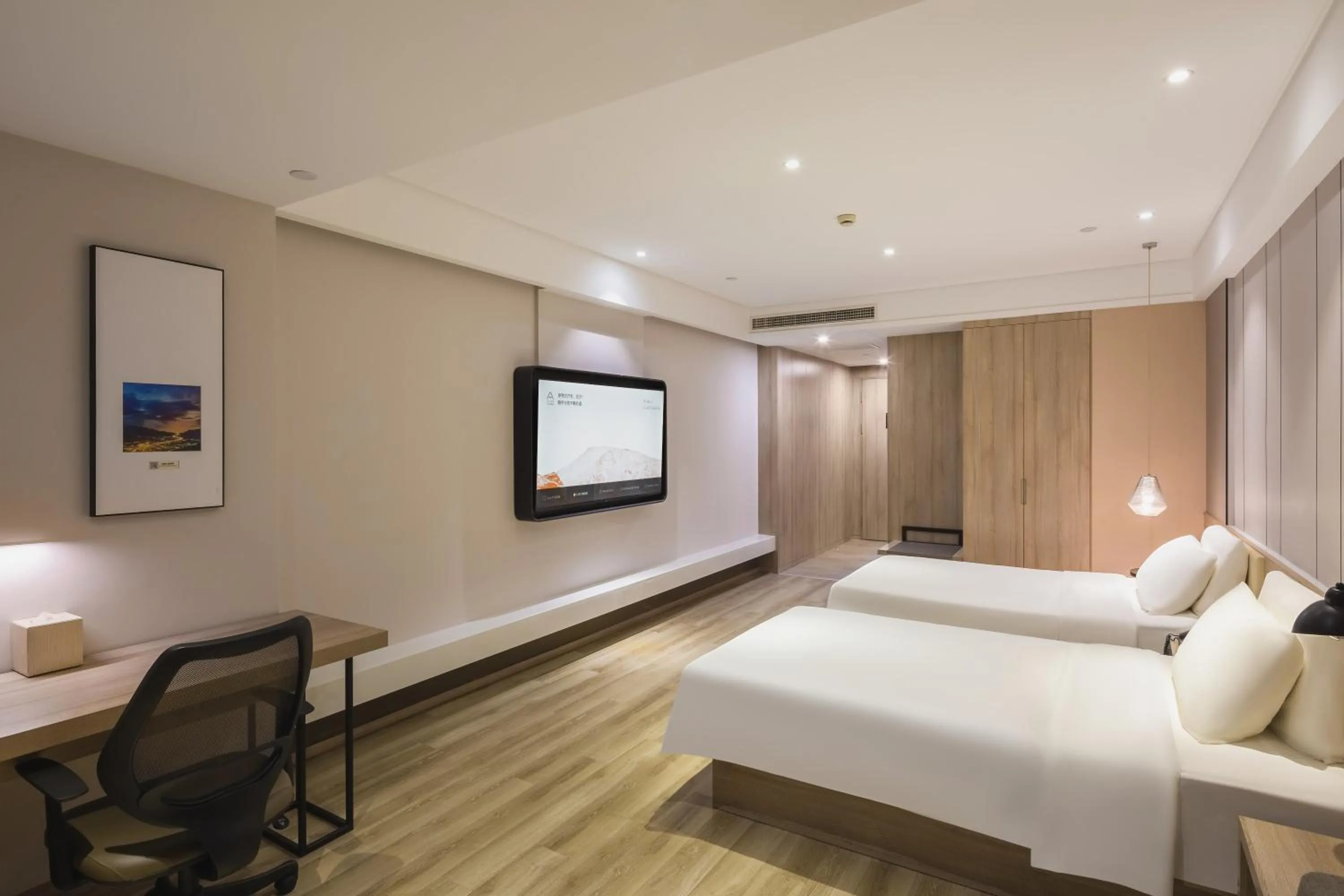 Photo of the whole room, Bed in Atour Jiaozhou Qingdao Hotel