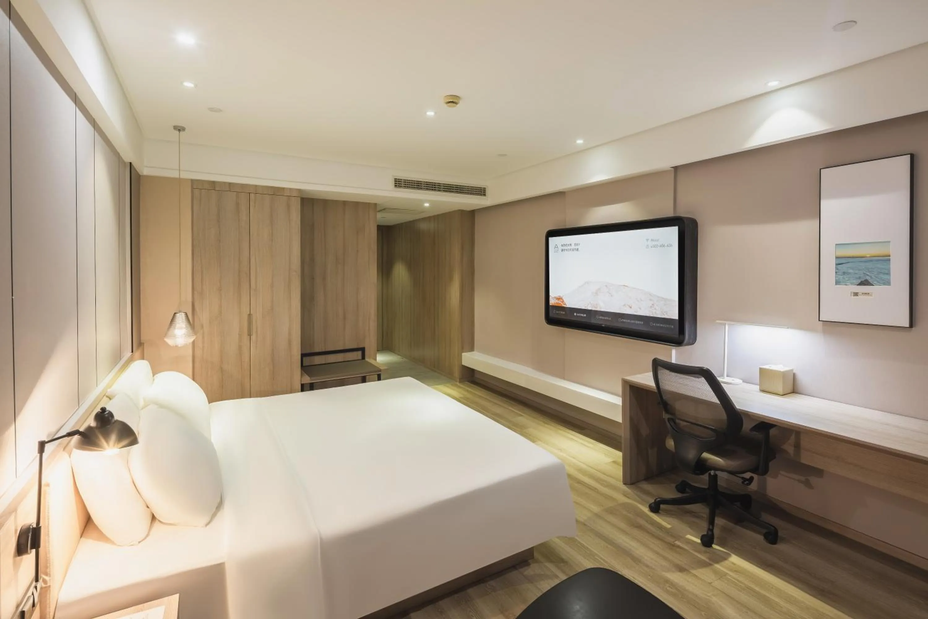 Photo of the whole room, Bed in Atour Jiaozhou Qingdao Hotel