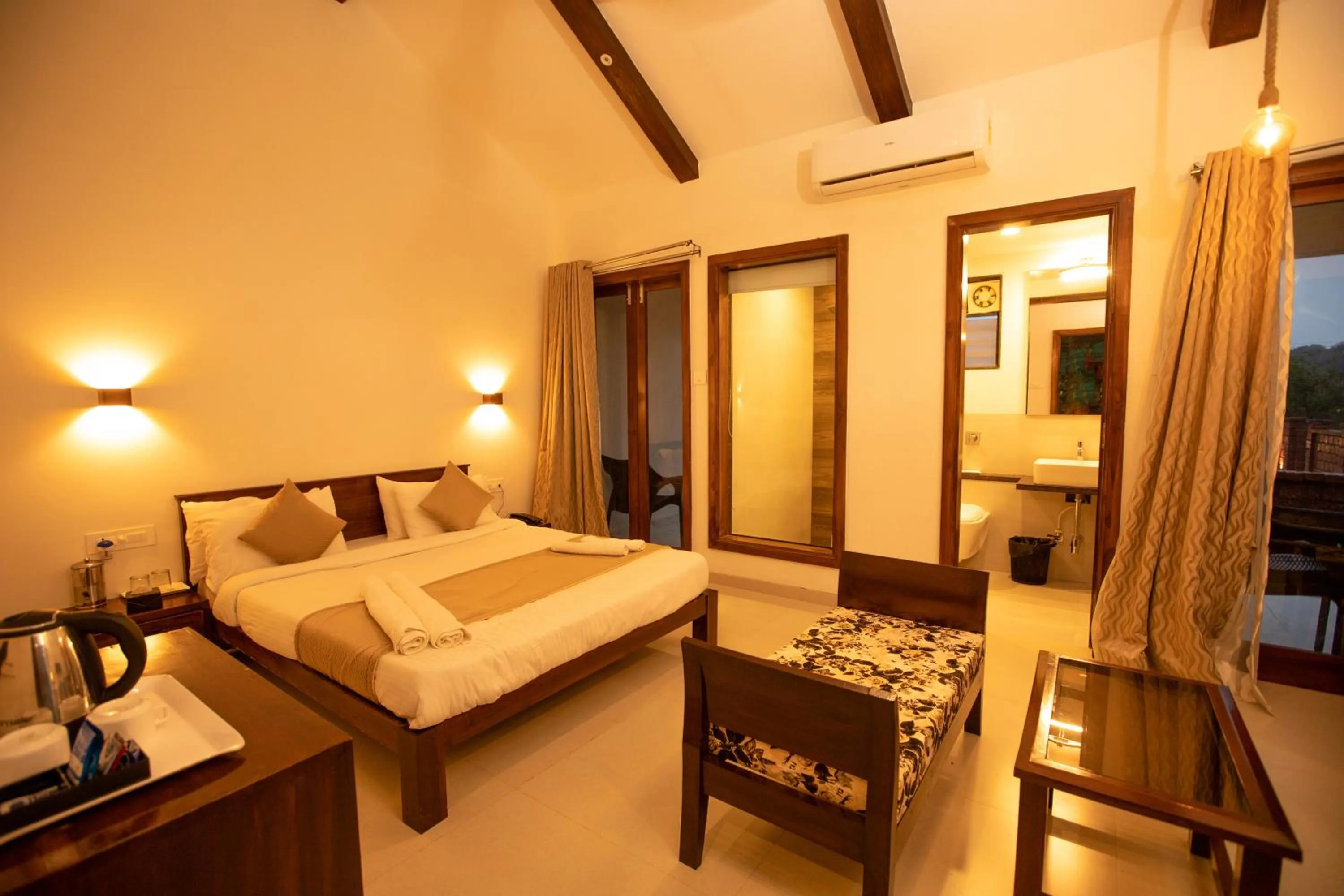 Bed in La Serene Resort and Spa