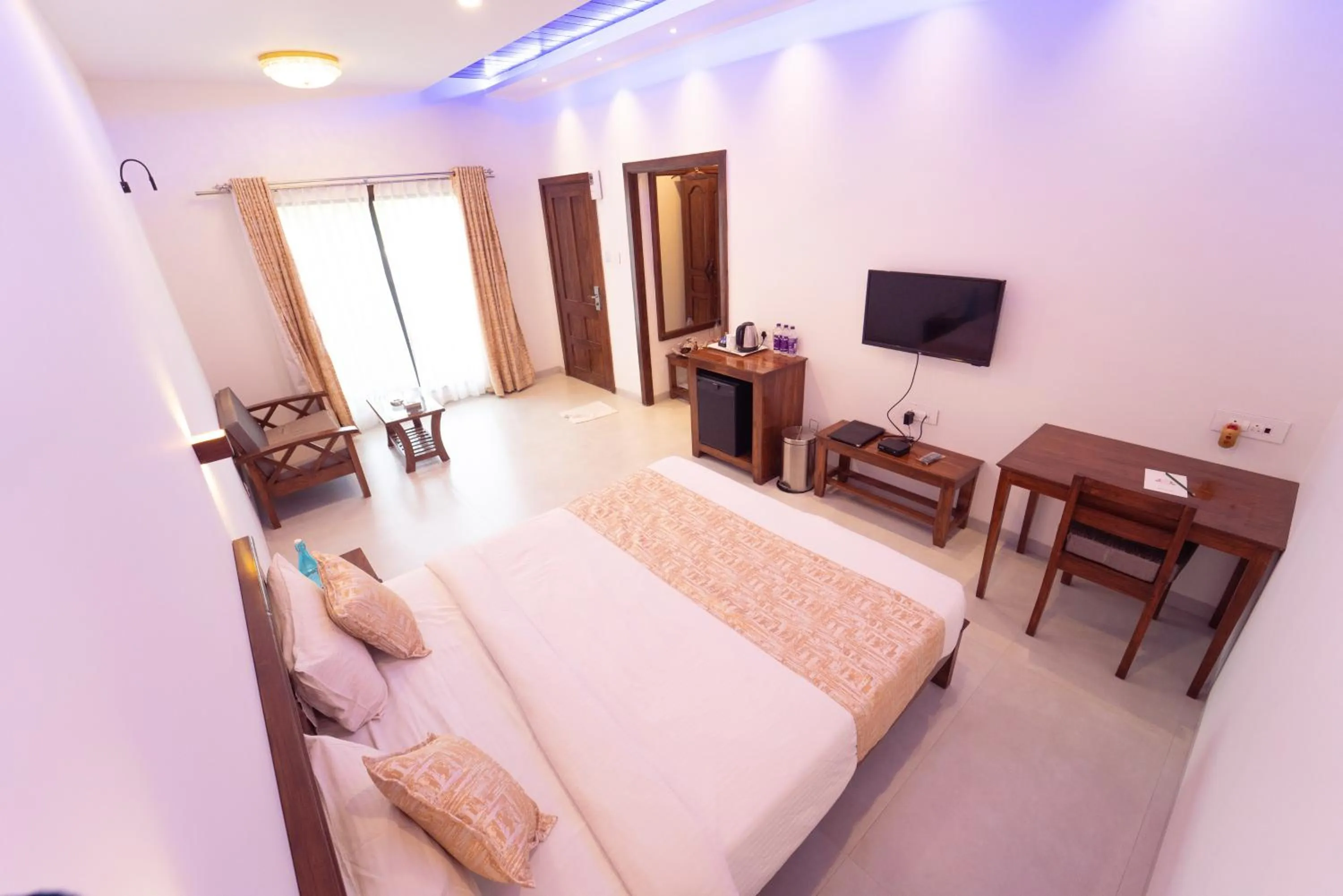 Bed in La Serene Resort and Spa