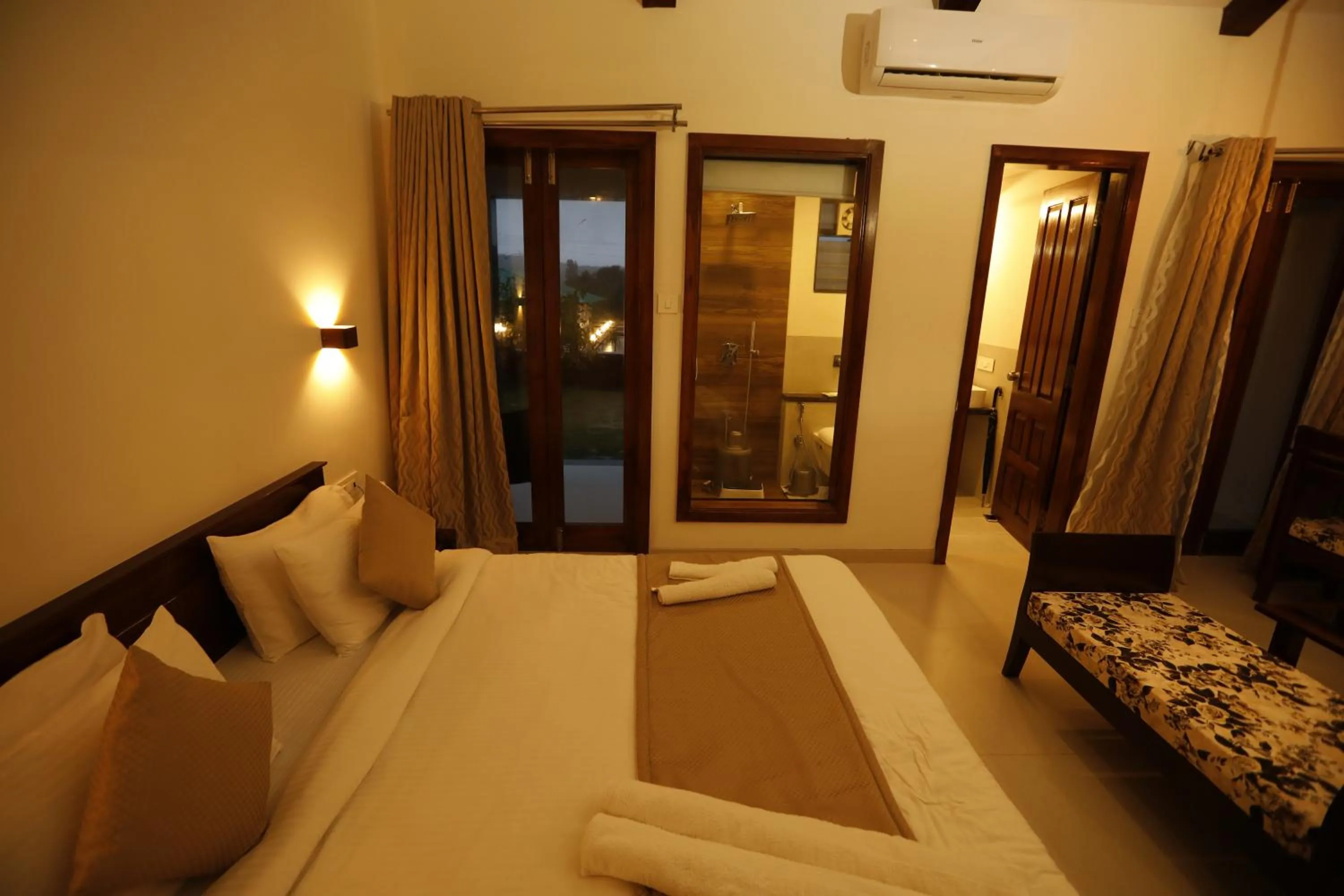 Bed in La Serene Resort and Spa