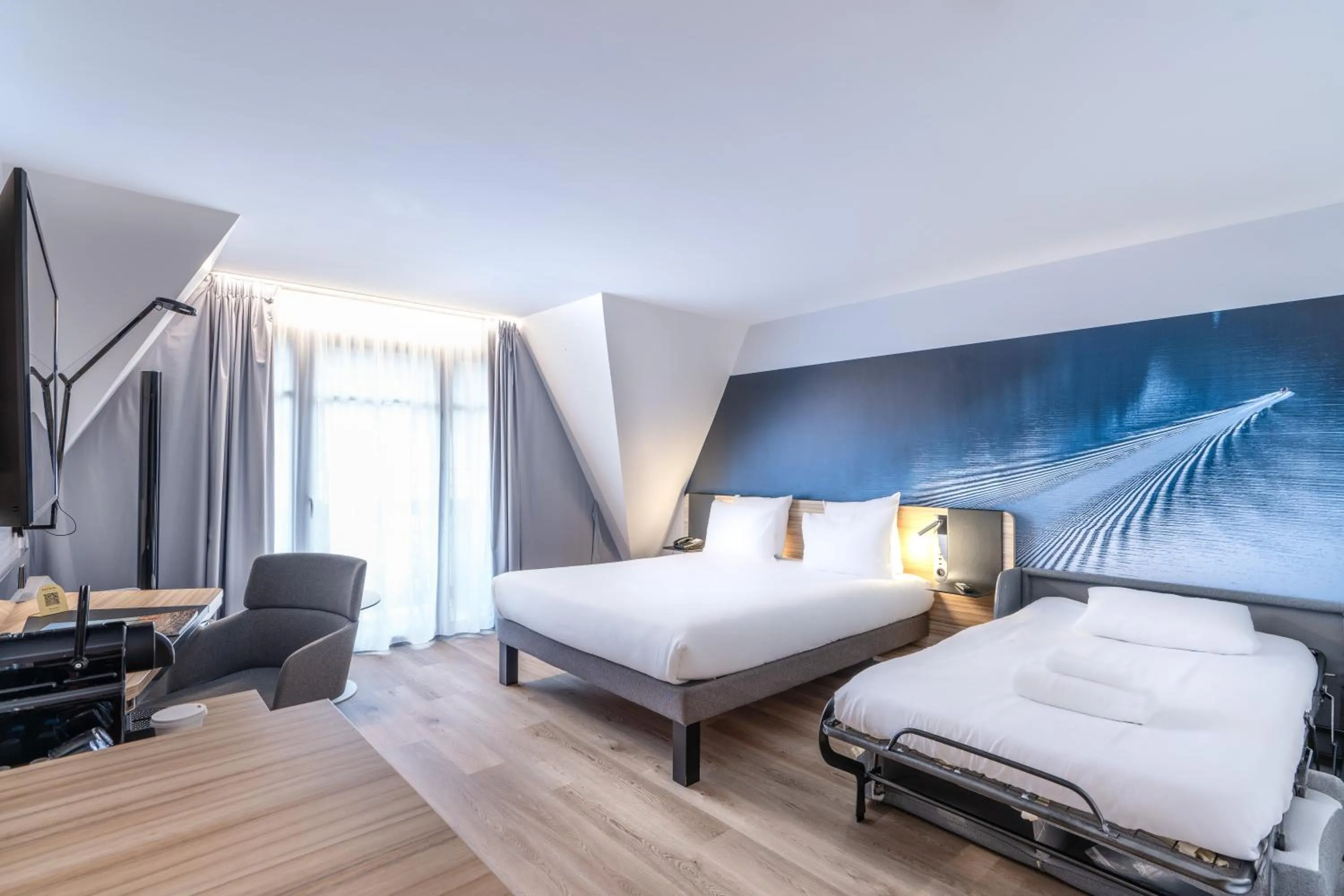 Photo of the whole room, Bed in Novotel Deauville Plage