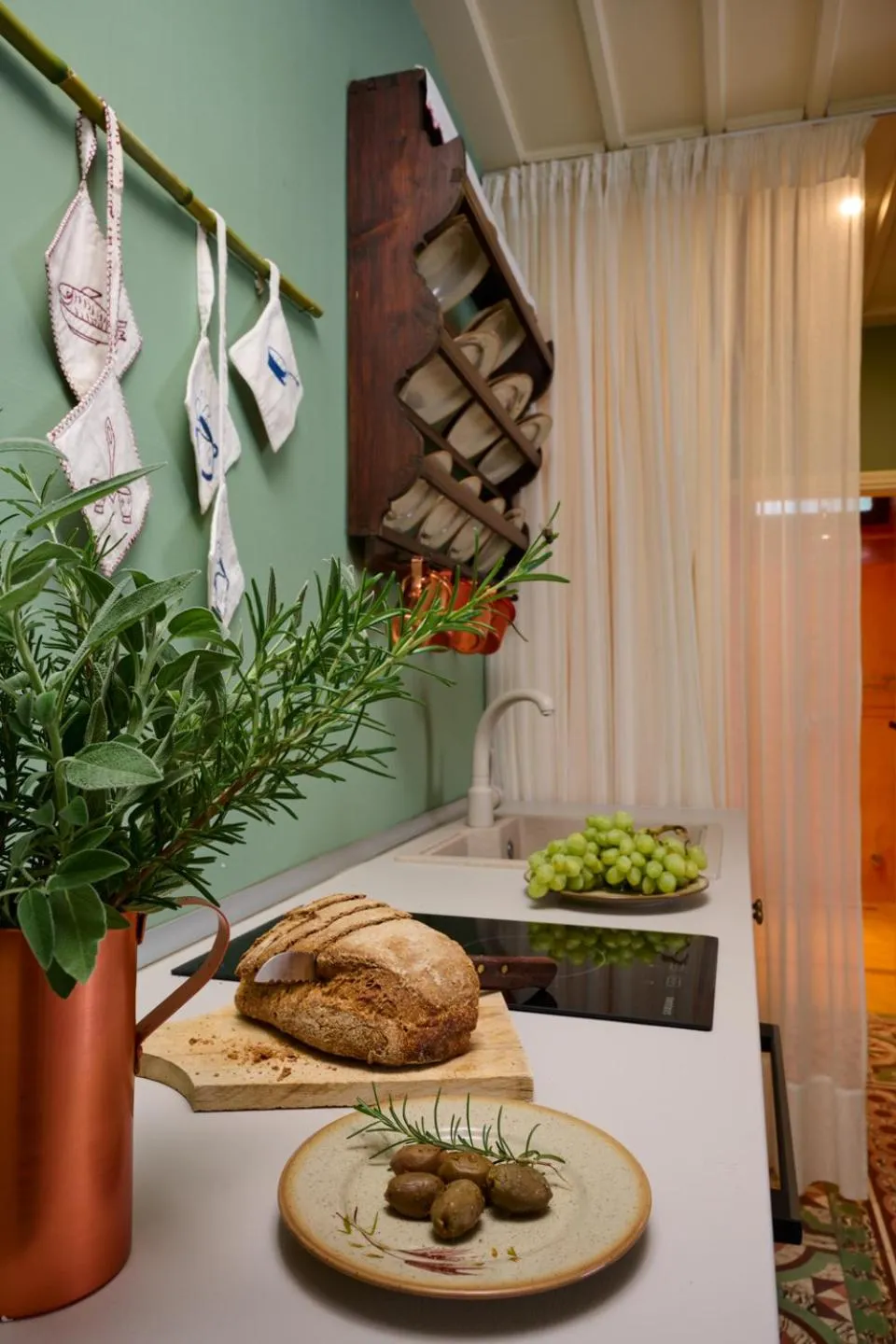 Kitchen or kitchenette in Sto Roloi Island Houses