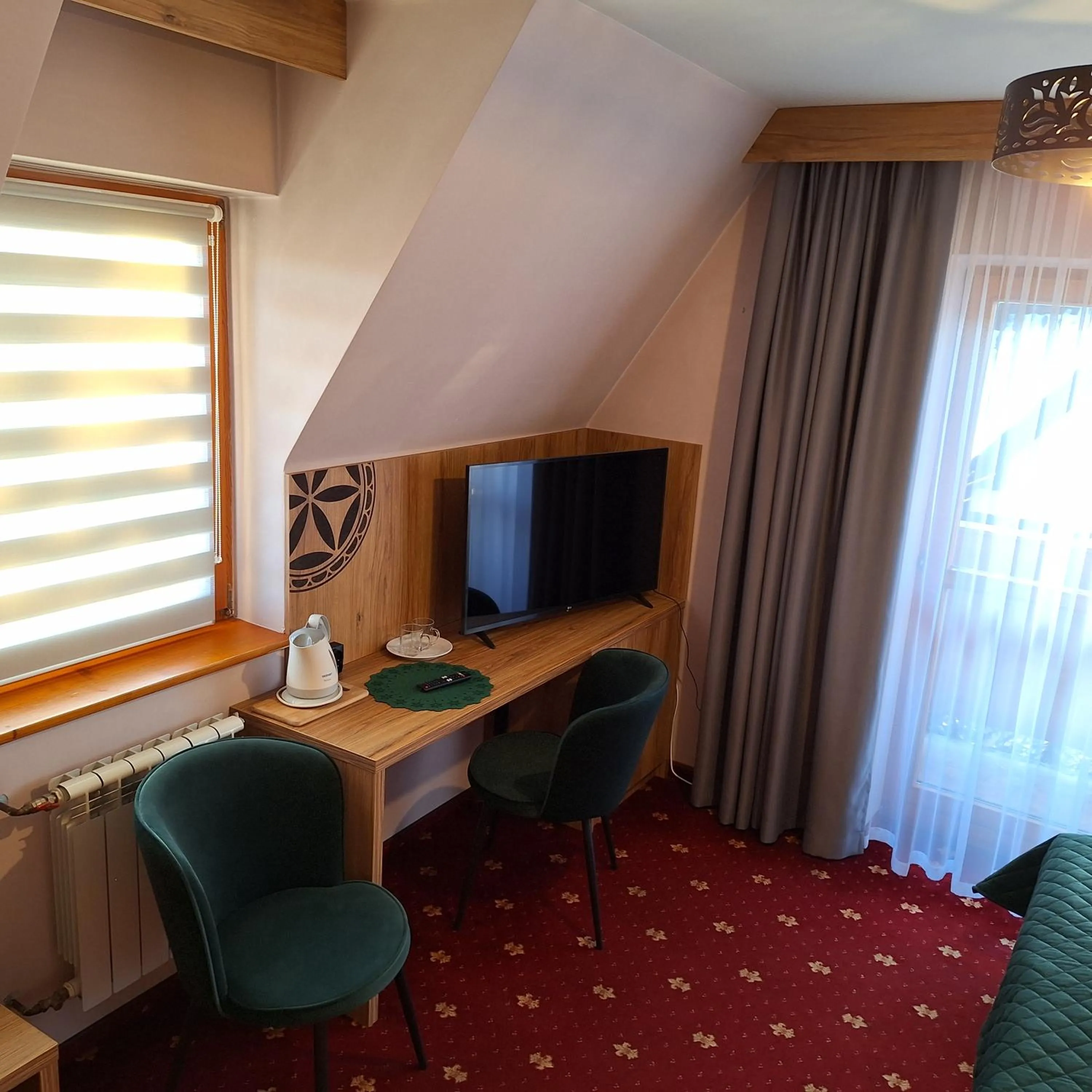 Communal lounge/ TV room in Willa u Kośle Zakopane