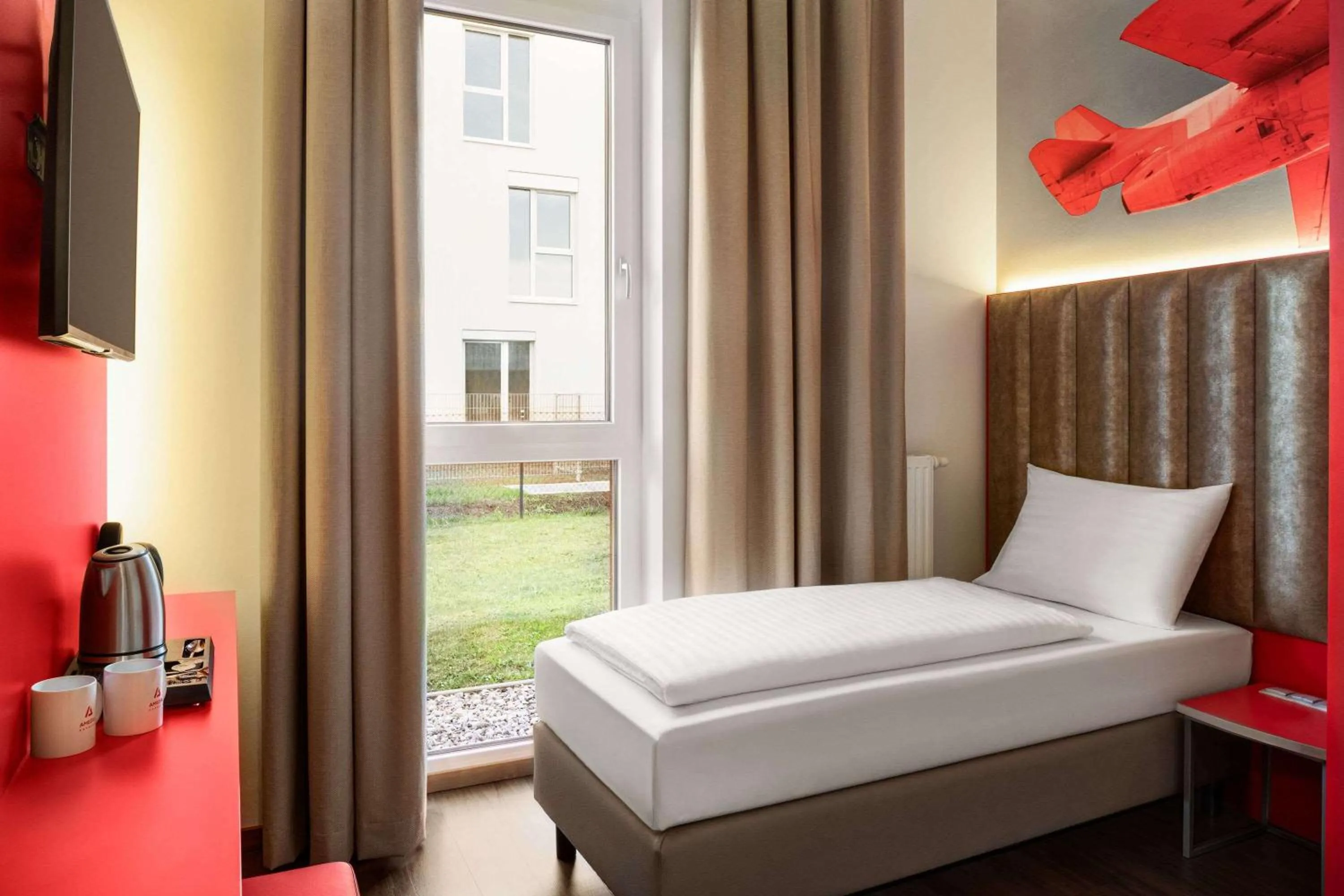 Photo of the whole room, Bed in Amedia Express Graz Airport, Trademark Collection by Wyndham