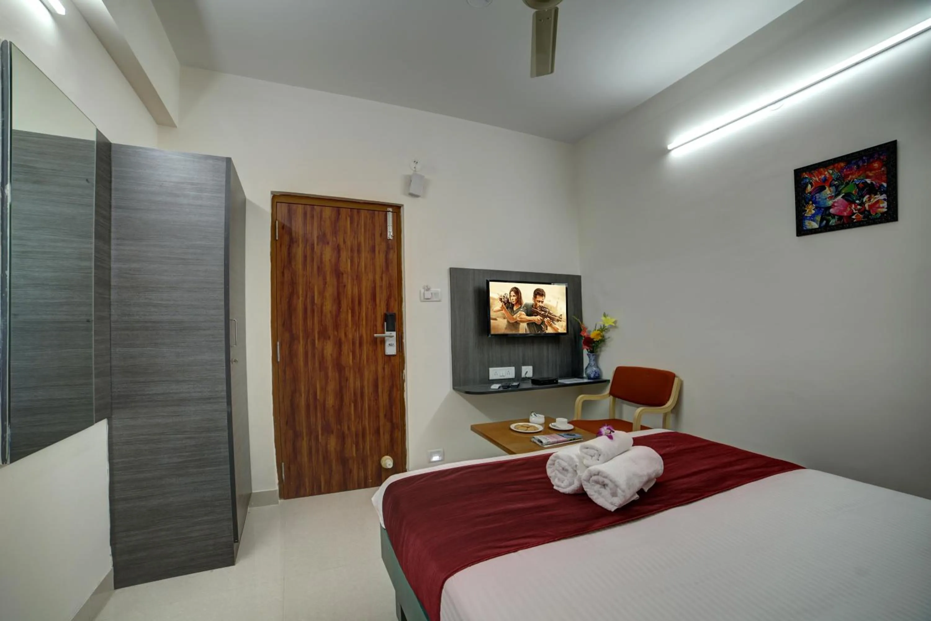 TV and multimedia, Bed in SM Royal Suites - Hotel near Kempegowda international Airport Bangalore