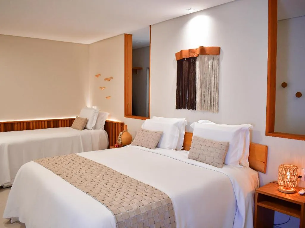 Bed in Pousada Sol e Mar